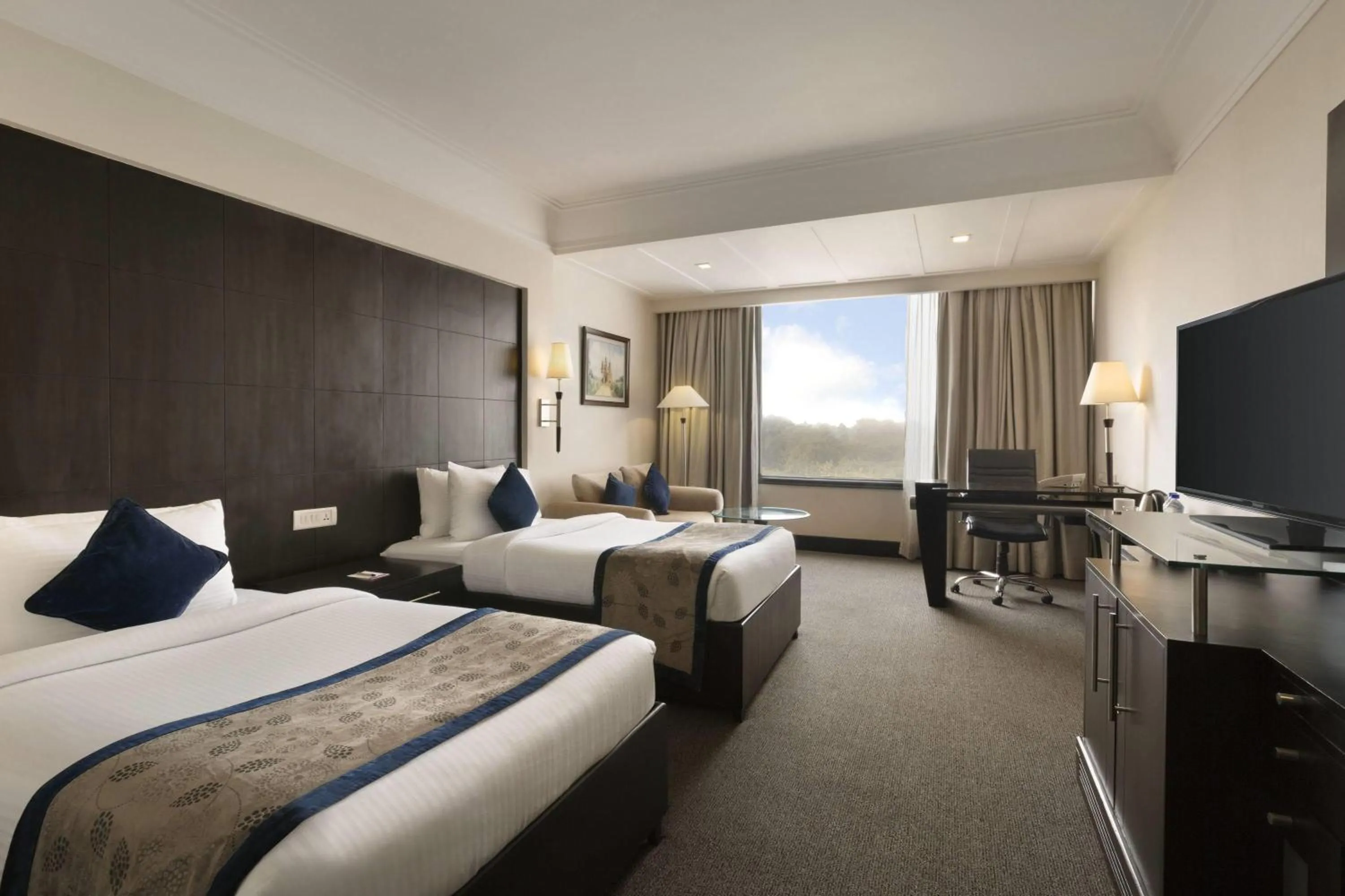 Photo of the whole room, Bed in Ramada Plaza by Wyndham JHV Varanasi