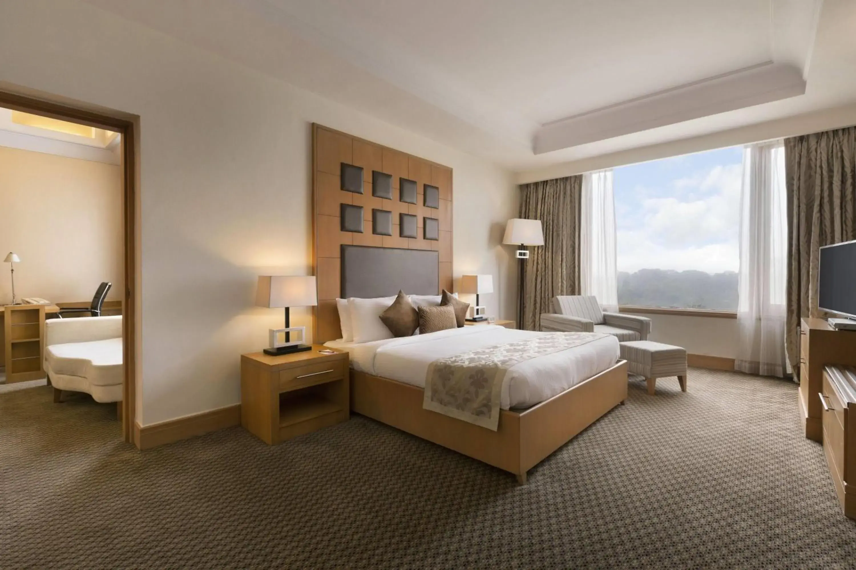 Photo of the whole room, Bed in Ramada Plaza by Wyndham JHV Varanasi Photo of the whole room, Bed in Ramada Plaza by Wyndham JHV Varanasi