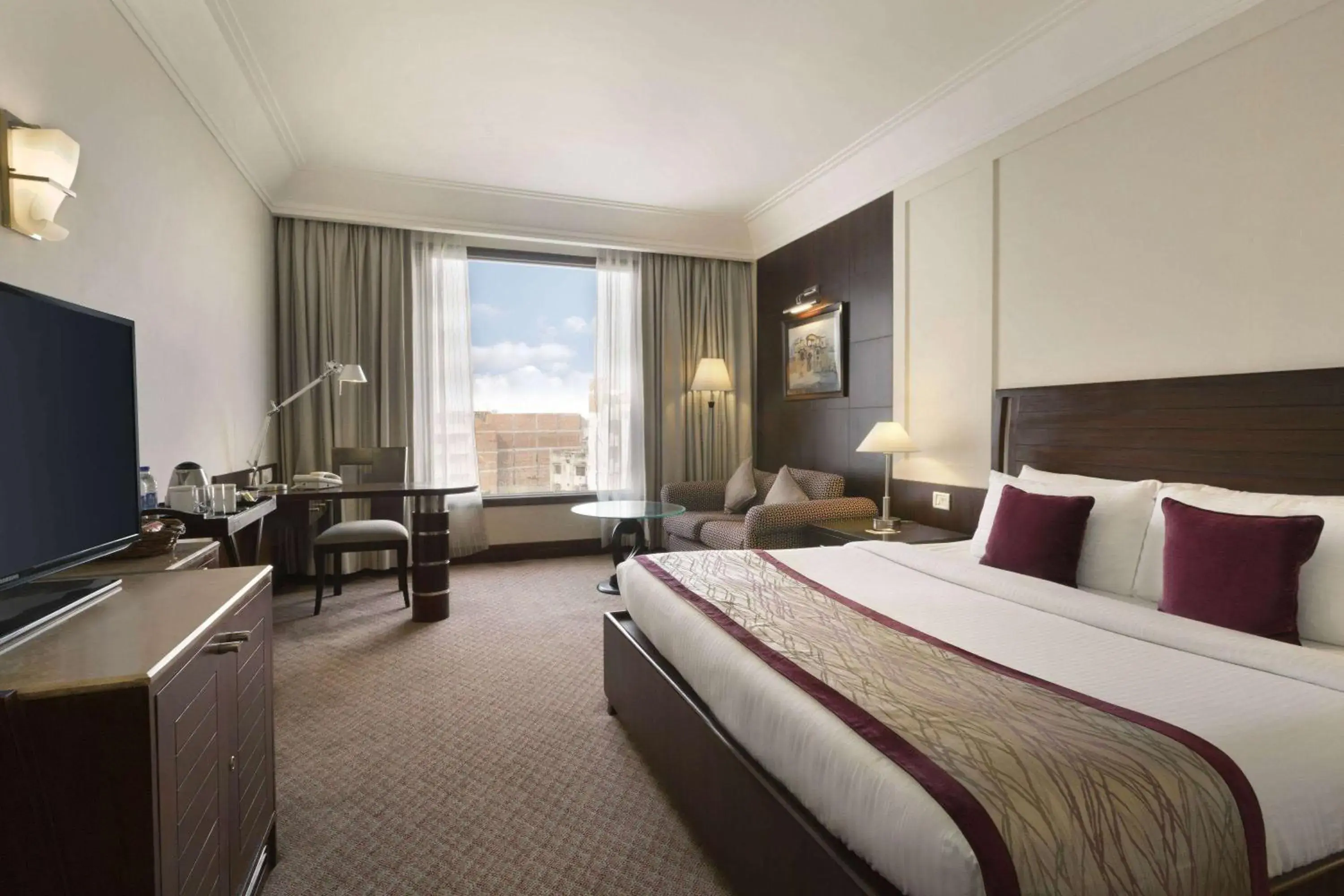 Photo of the whole room, Bed in Ramada Plaza by Wyndham JHV Varanasi Photo of the whole room, Bed in Ramada Plaza by Wyndham JHV Varanasi