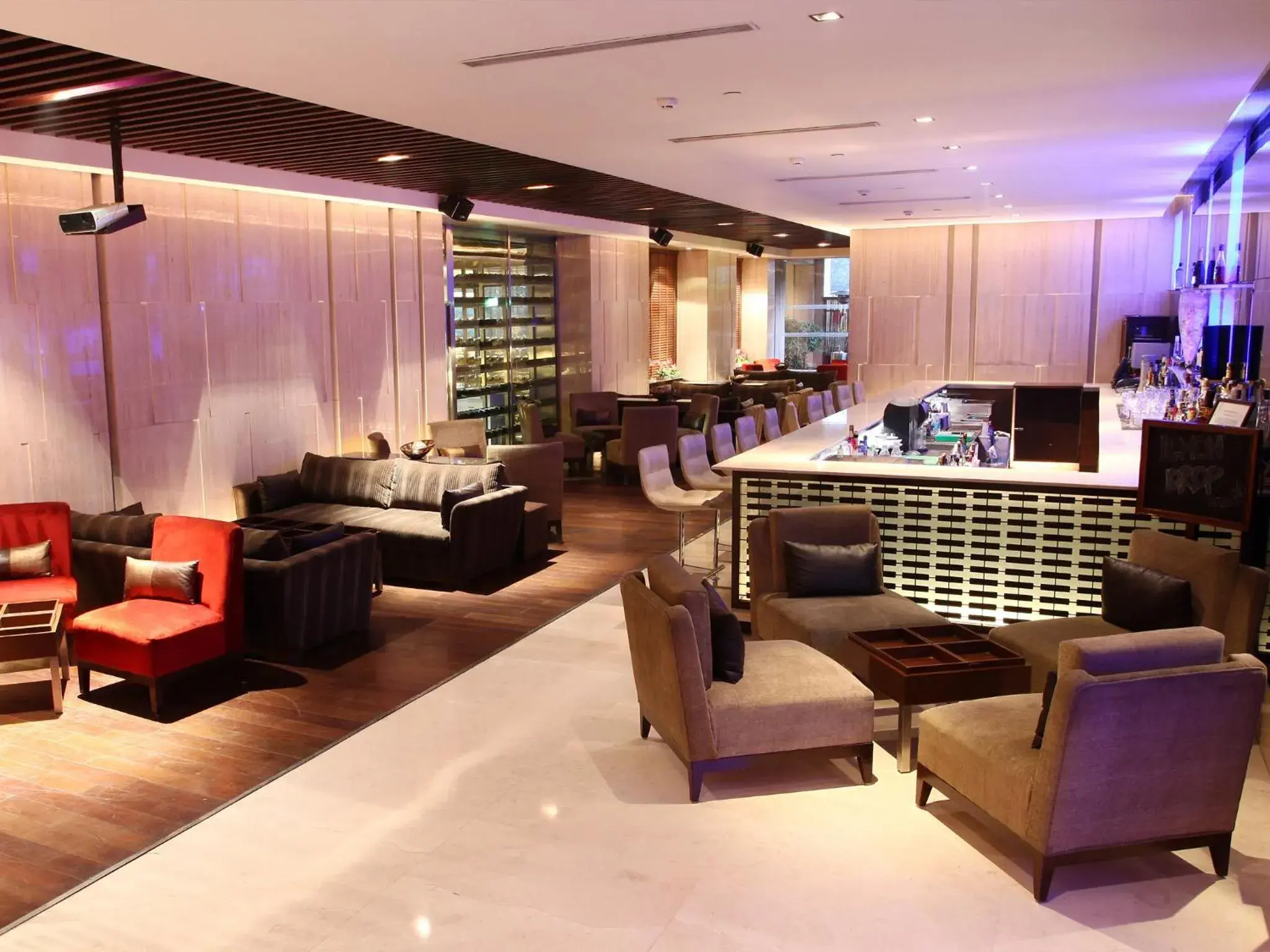 Lounge or bar in The LaLiT New Delhi Lounge or bar in The LaLiT New Delhi