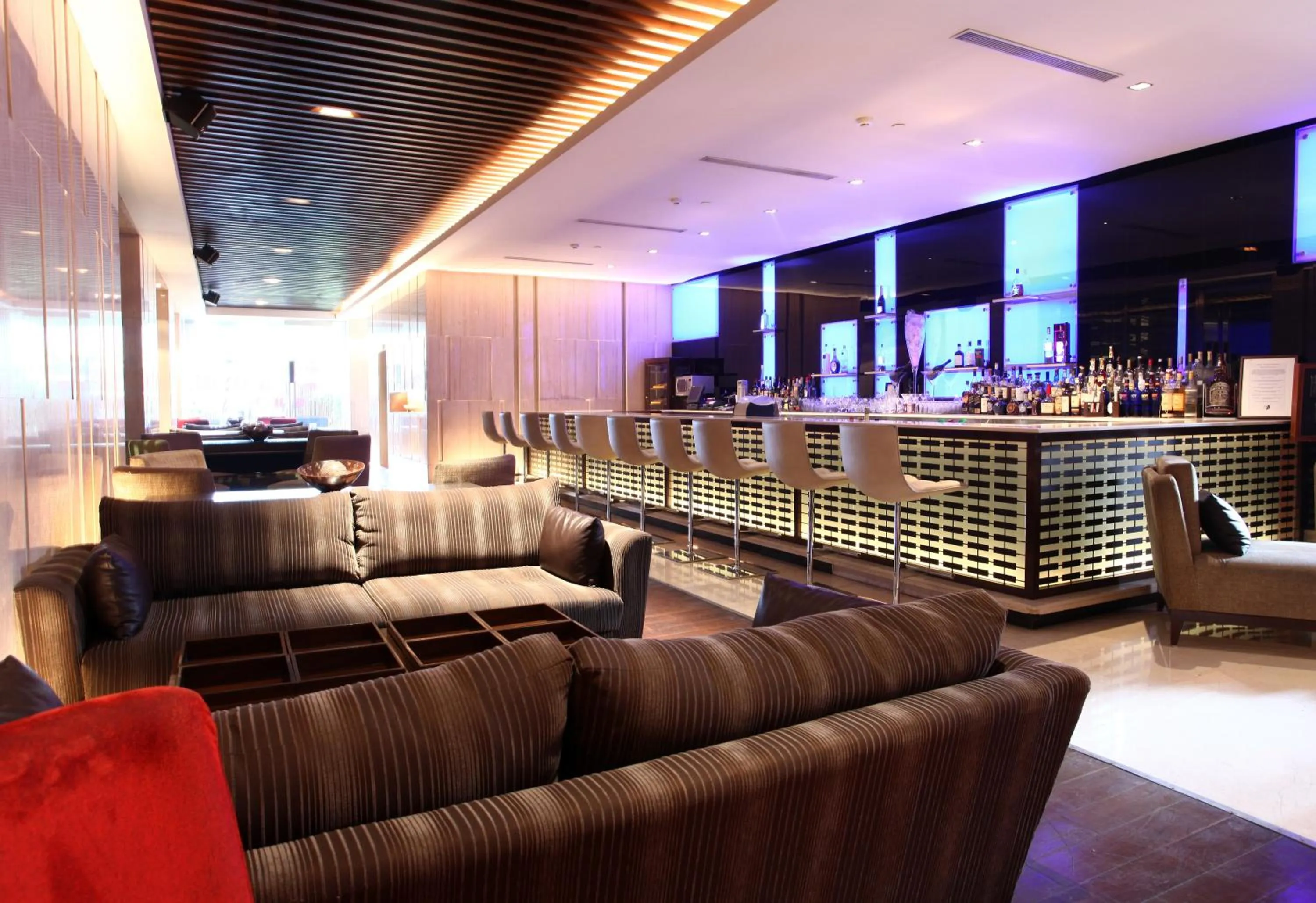 Lounge or bar in The LaLiT New Delhi