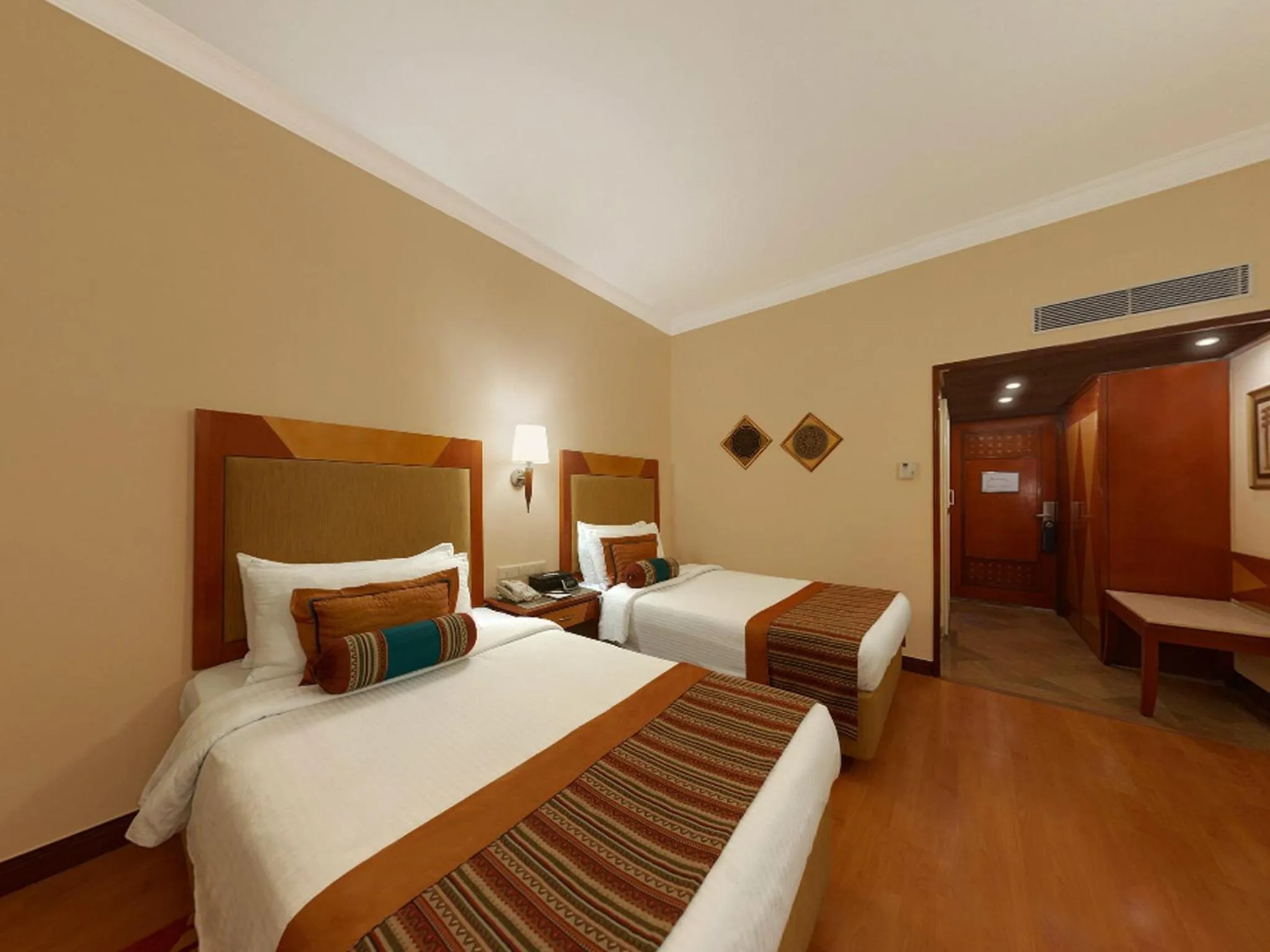 Bed in The Lalit Ashok