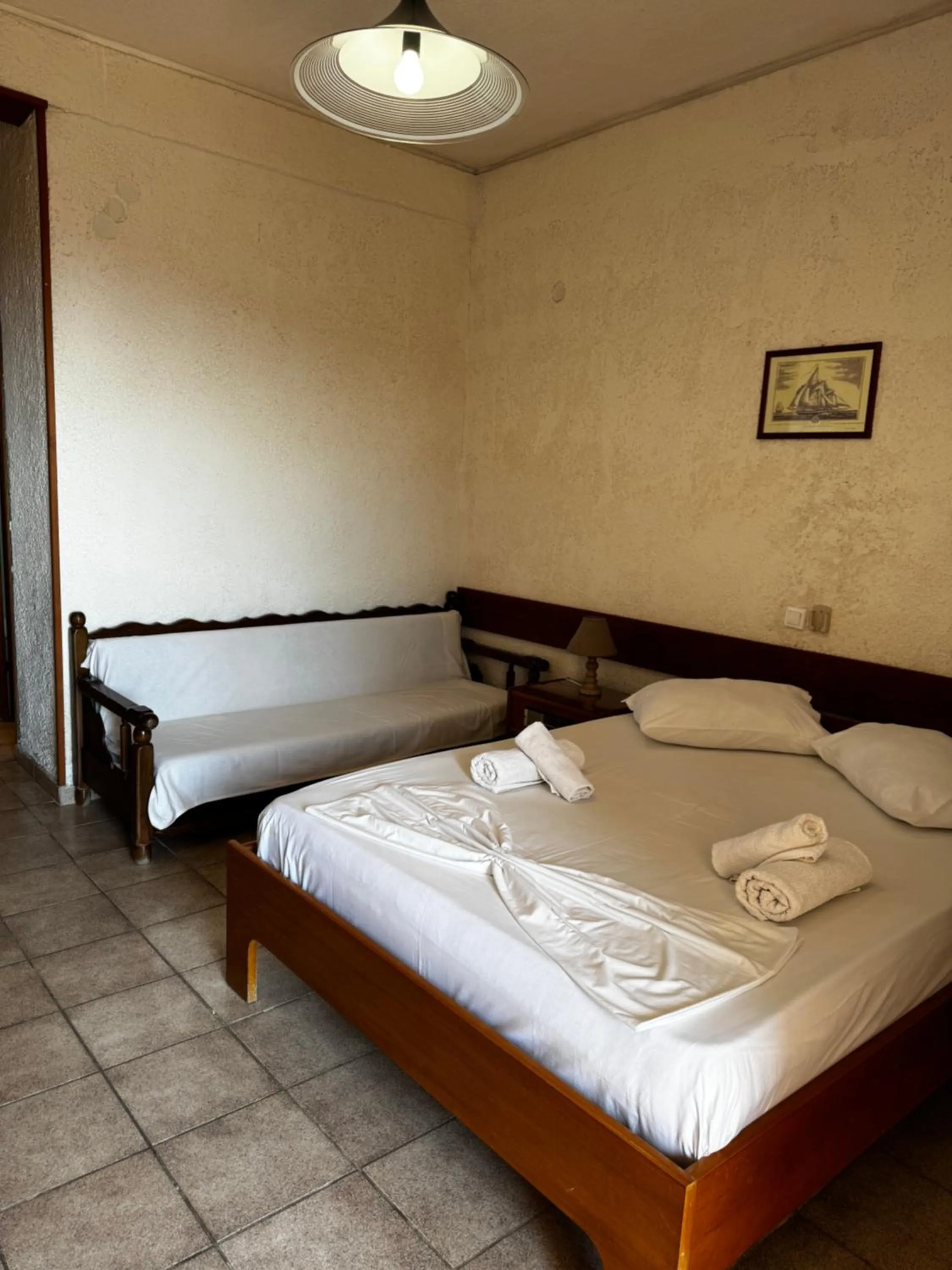 Bed in Sariza Spring Hotel