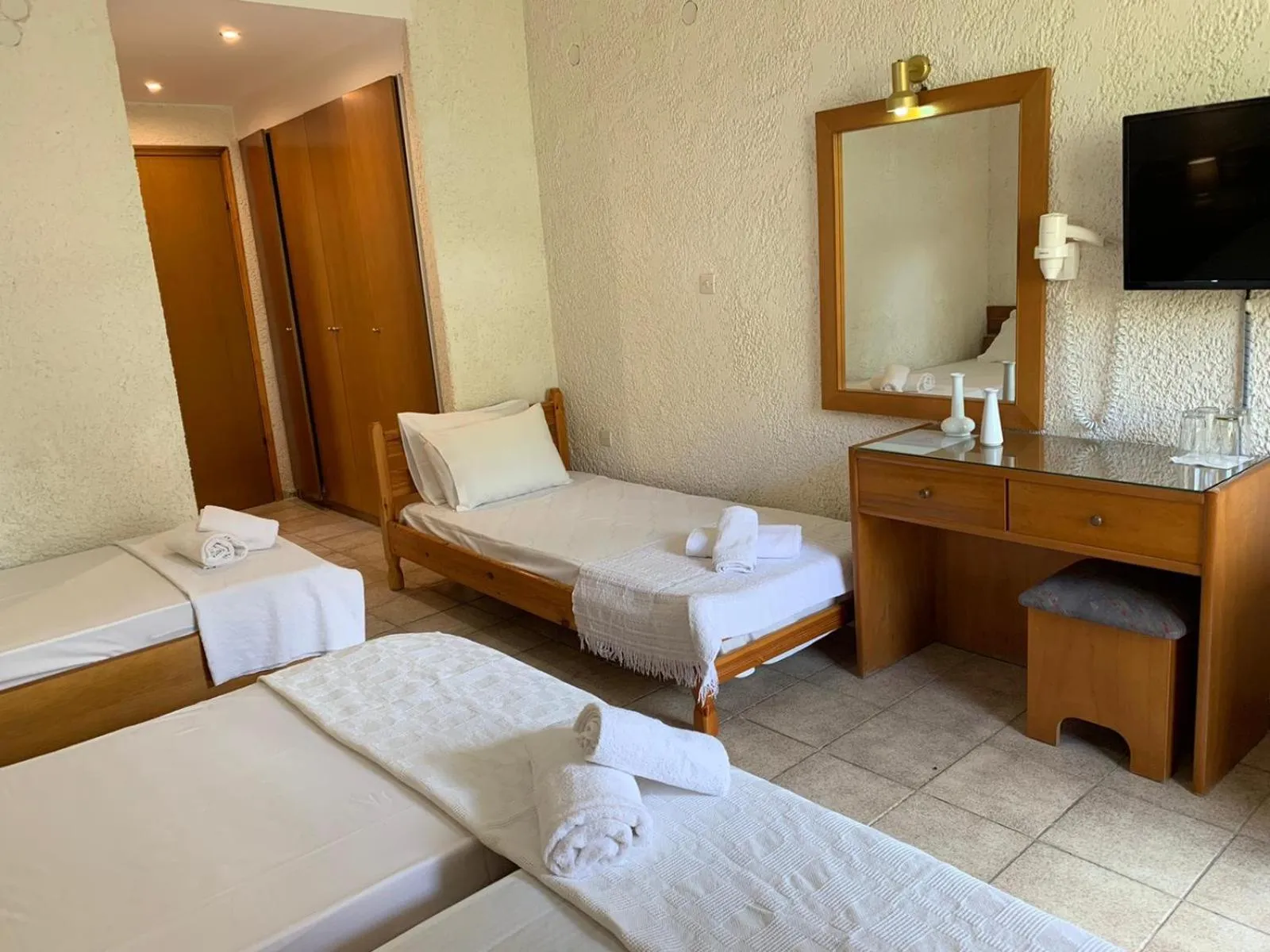 Bed in Sariza Spring Hotel