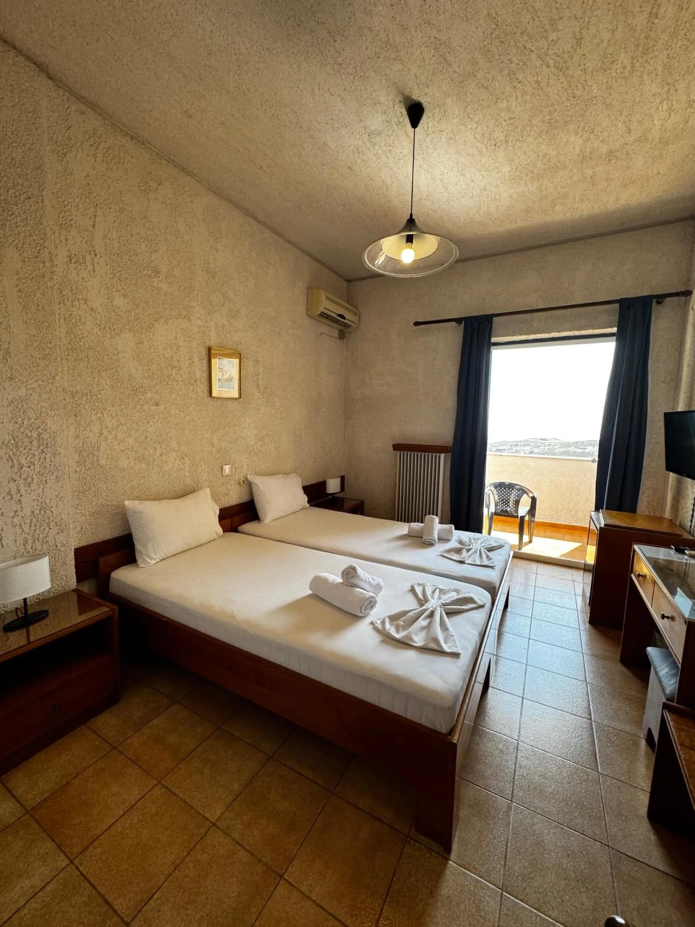 Bed in Sariza Spring Hotel