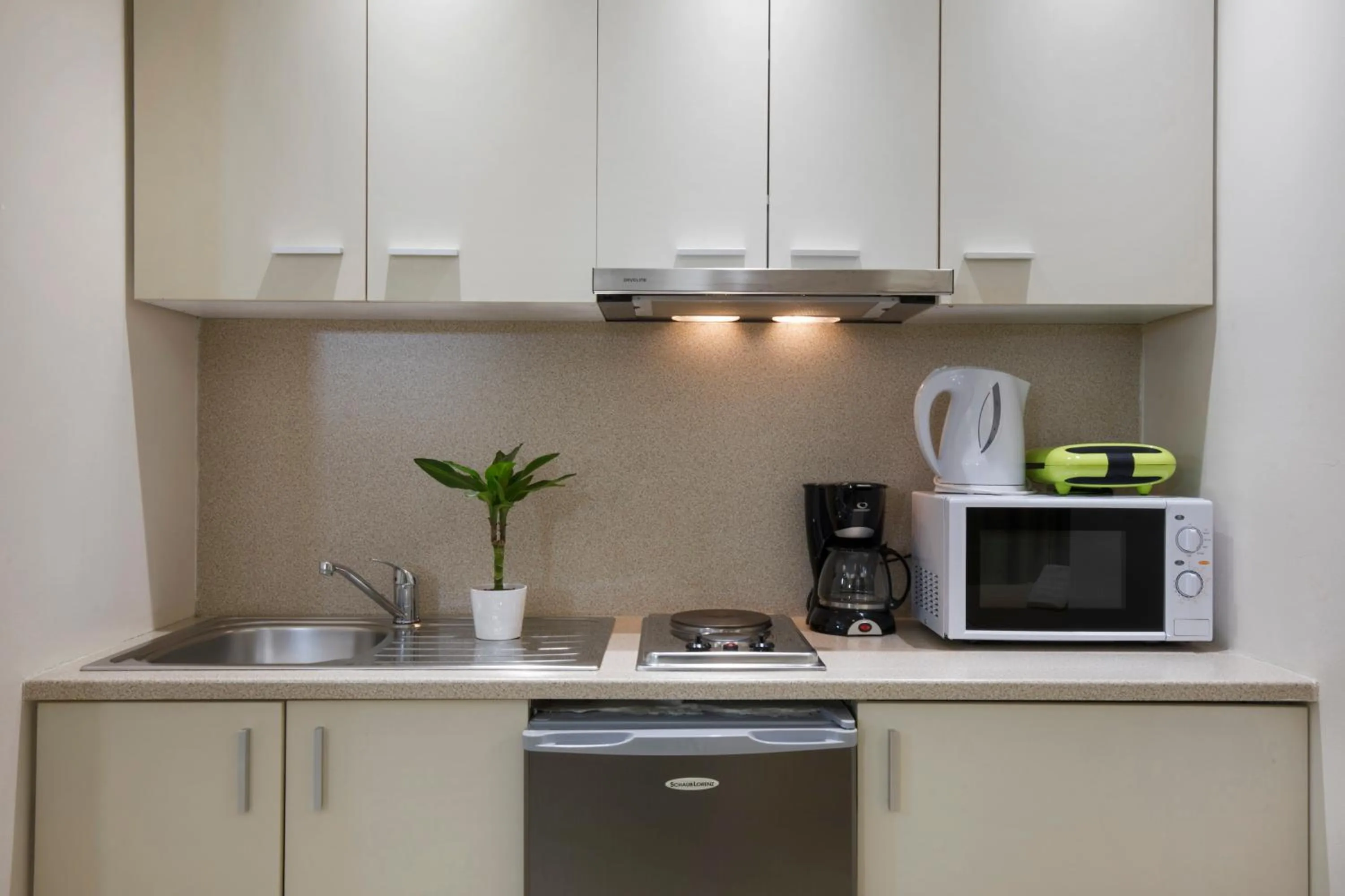 Kitchen or kitchenette in Polis Apartments