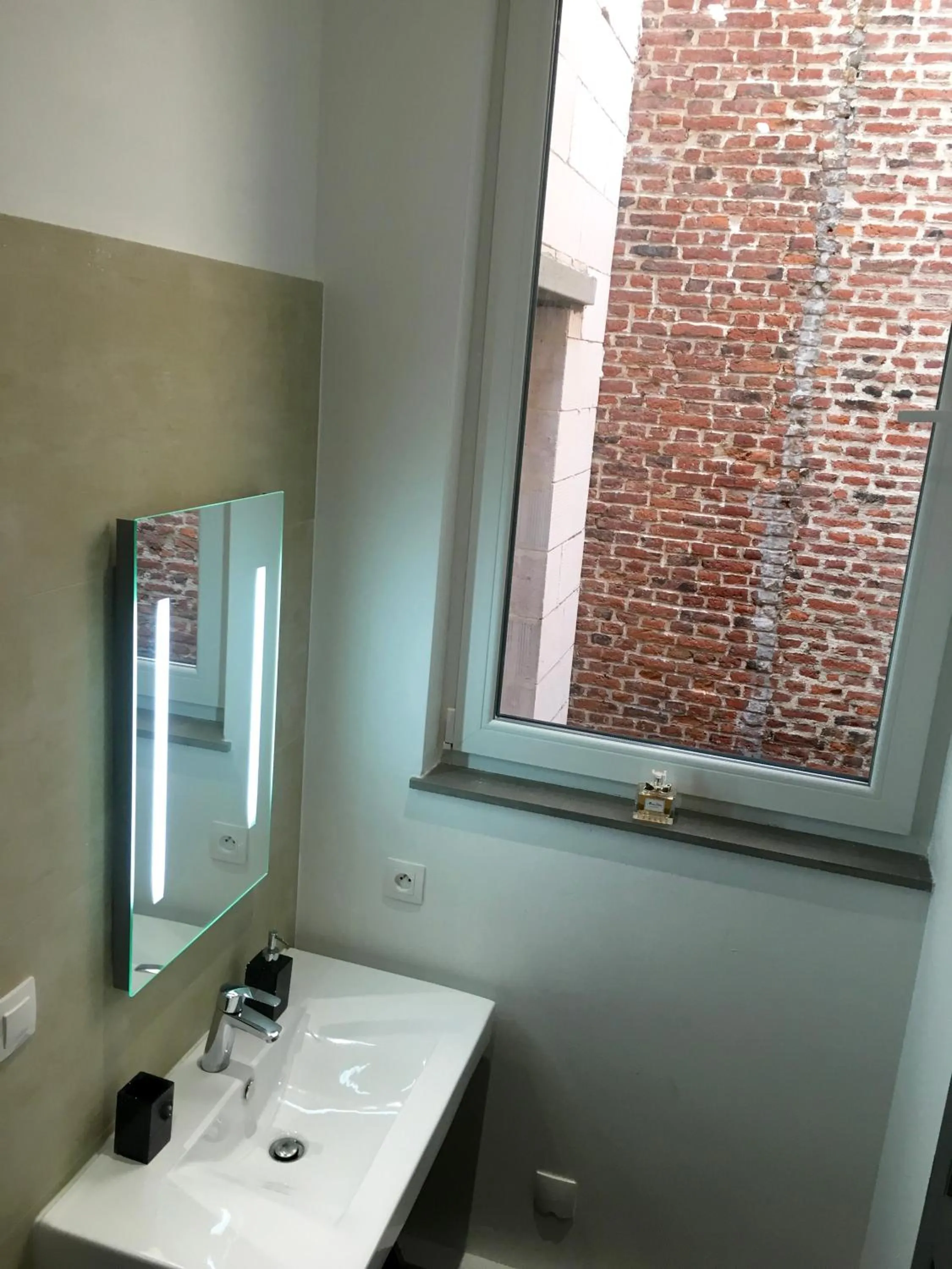 Bathroom in LITTLE PLAZA Appart'Hotel