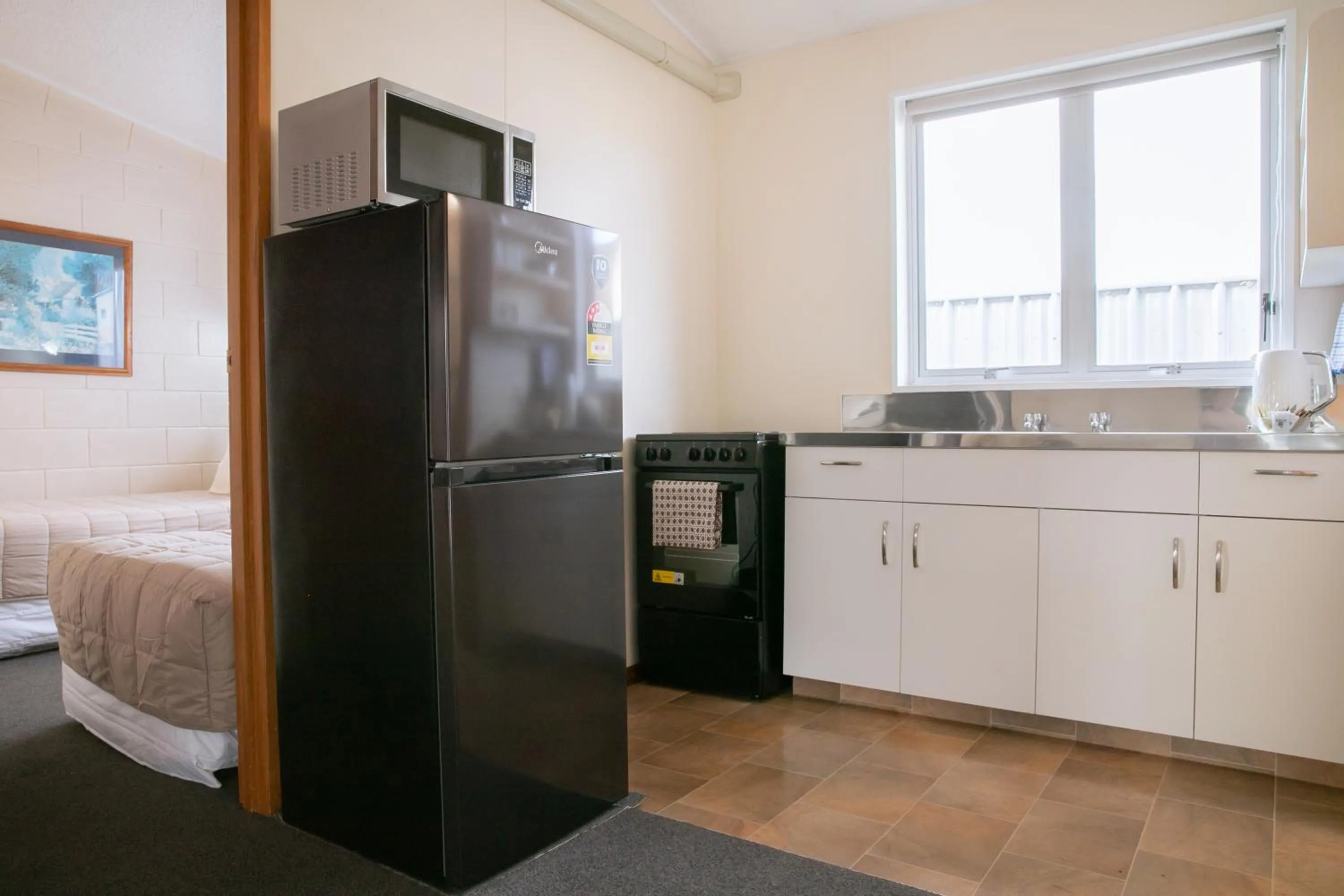 Kitchen or kitchenette in Tuki Tuki Motel