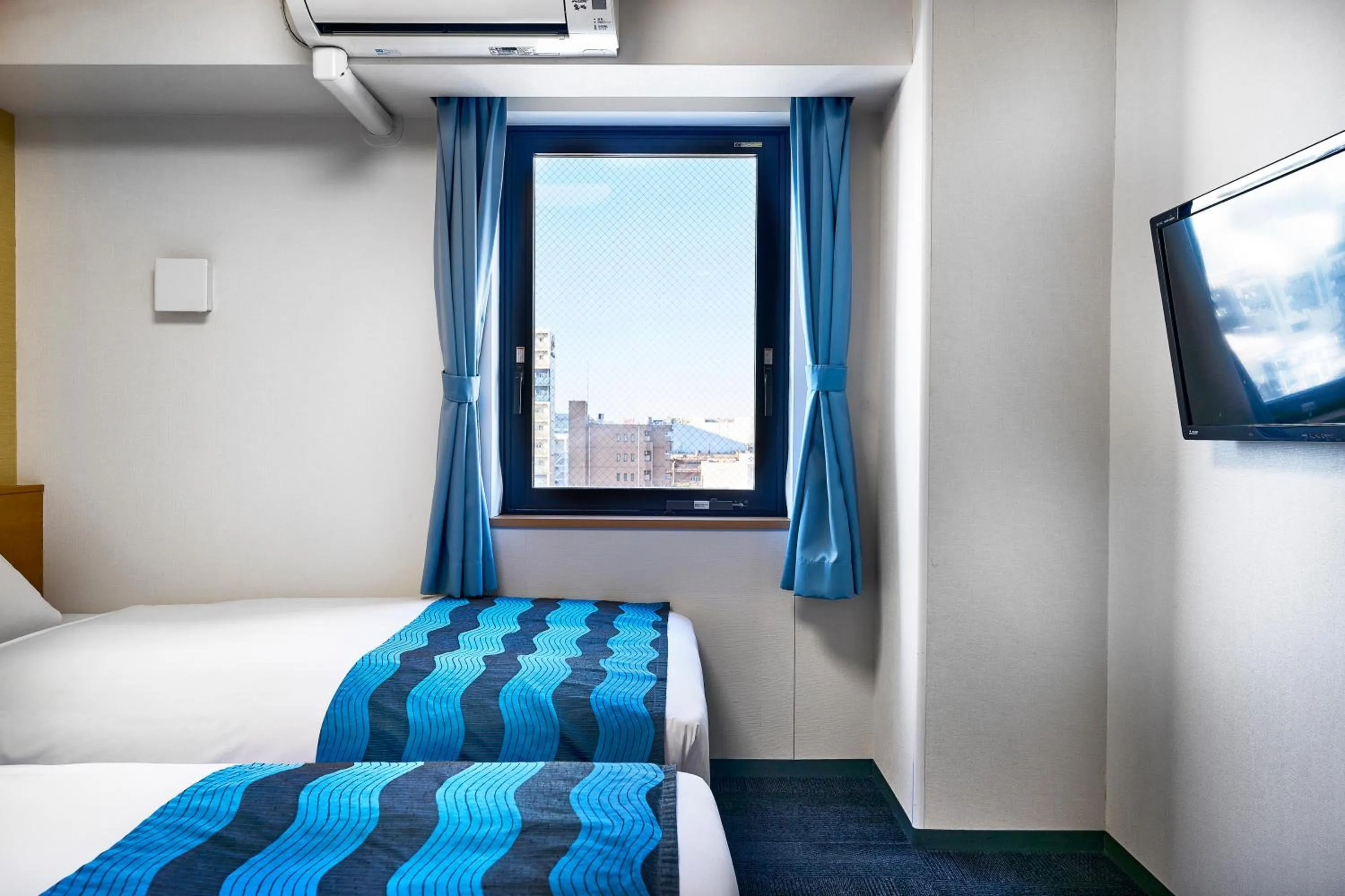 Bed in Hotel Sobial Osaka Dome