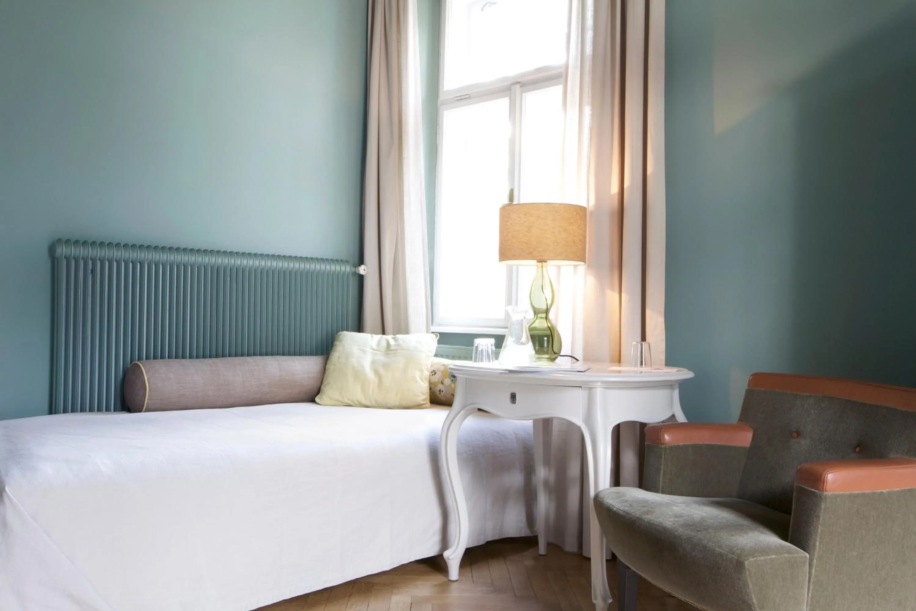 Bed in Das REGINA Boutiquehotel