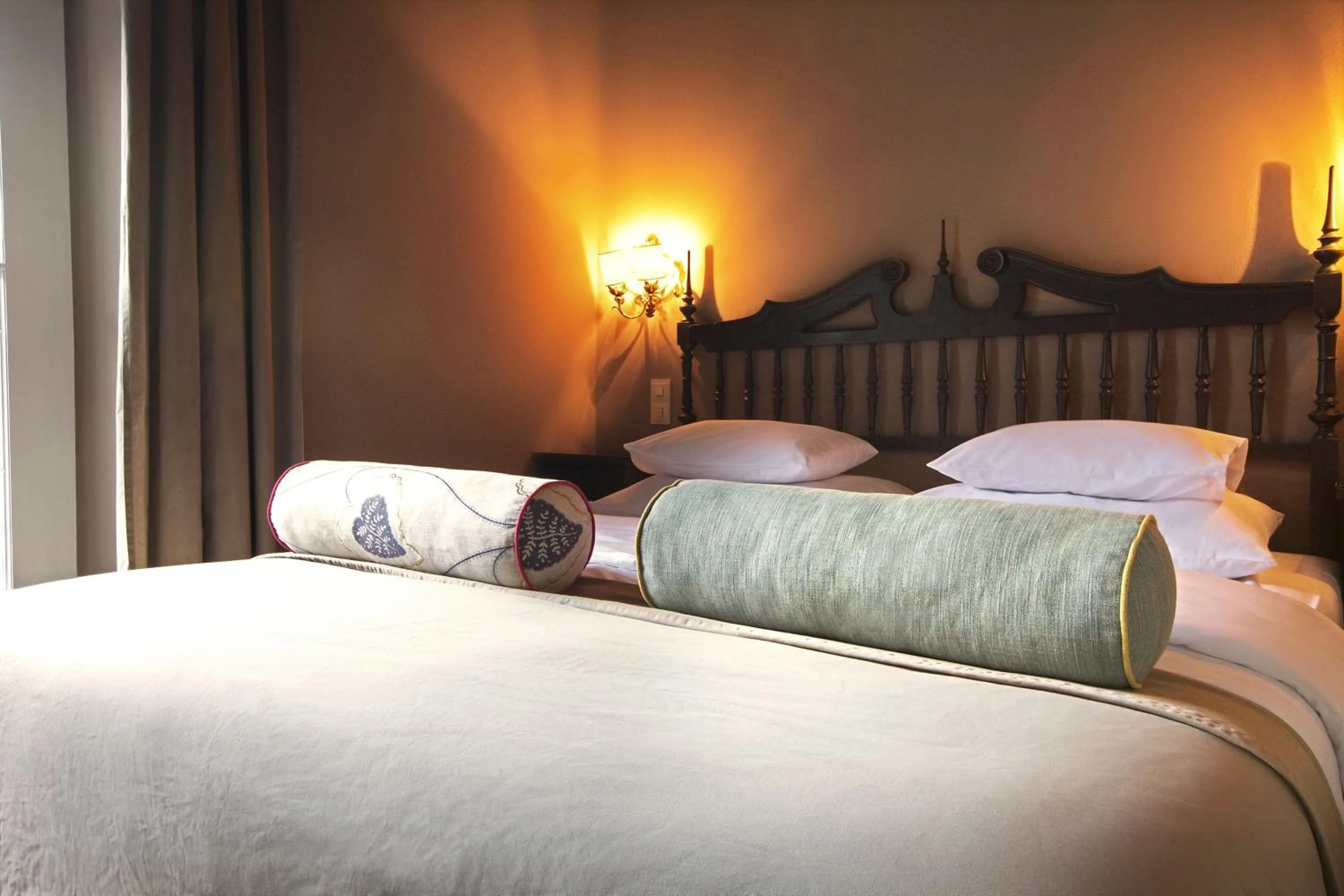 Bed in Das REGINA Boutiquehotel