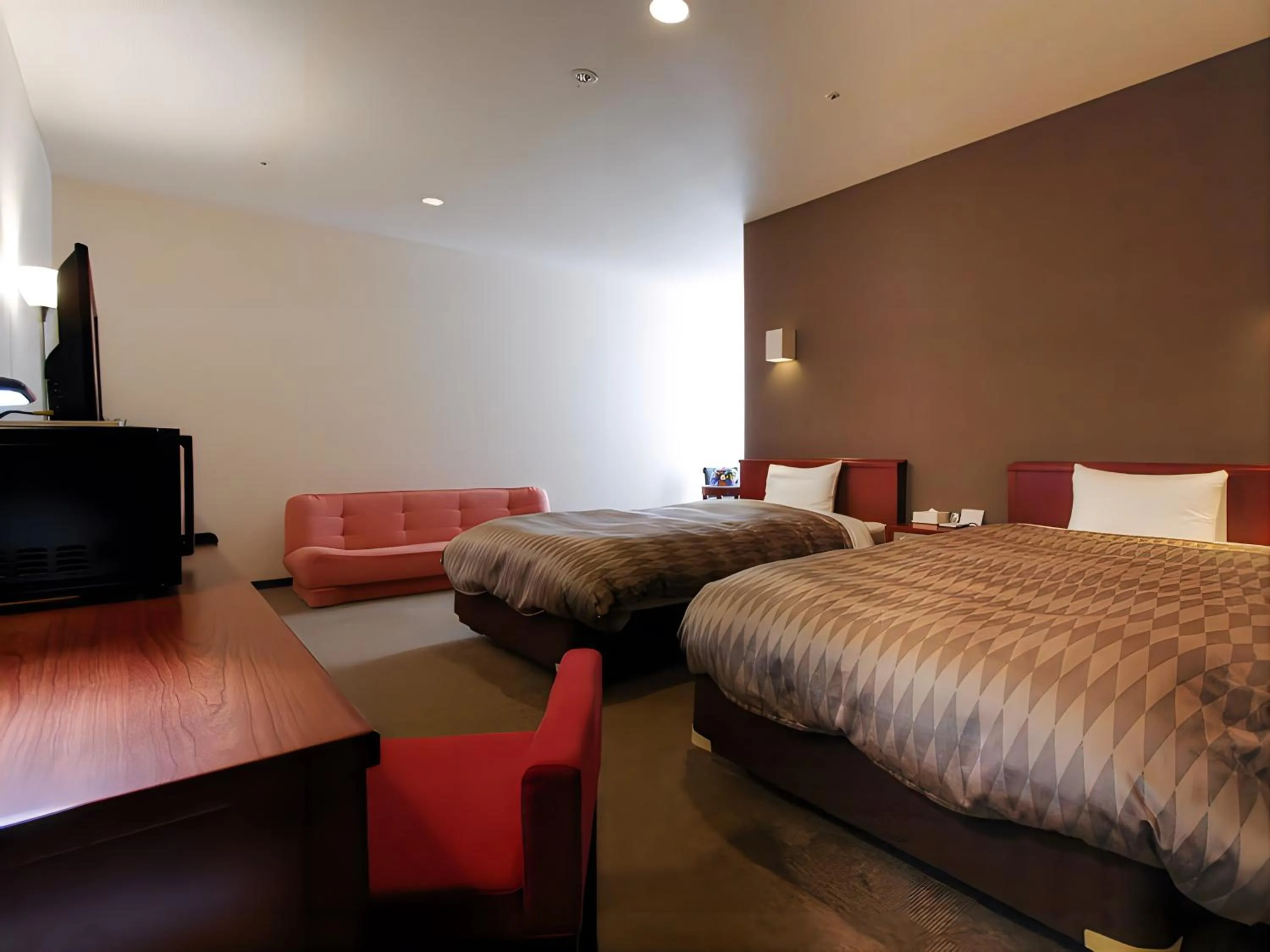 Bed in HOTEL LiVEMAX BUDGET Hamamatsu-Ekimae