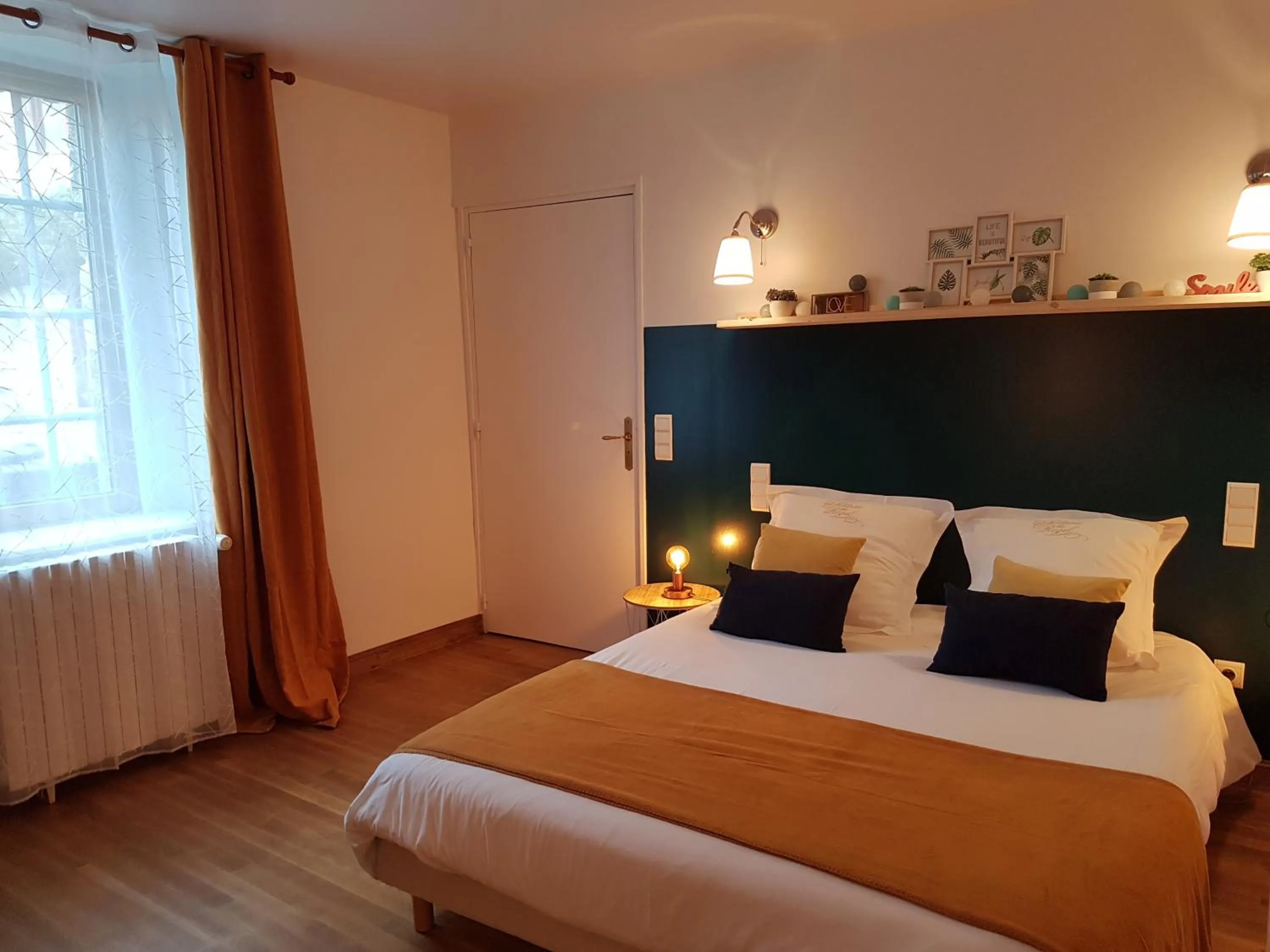 Bed in Les Chambres du Château du Rozel