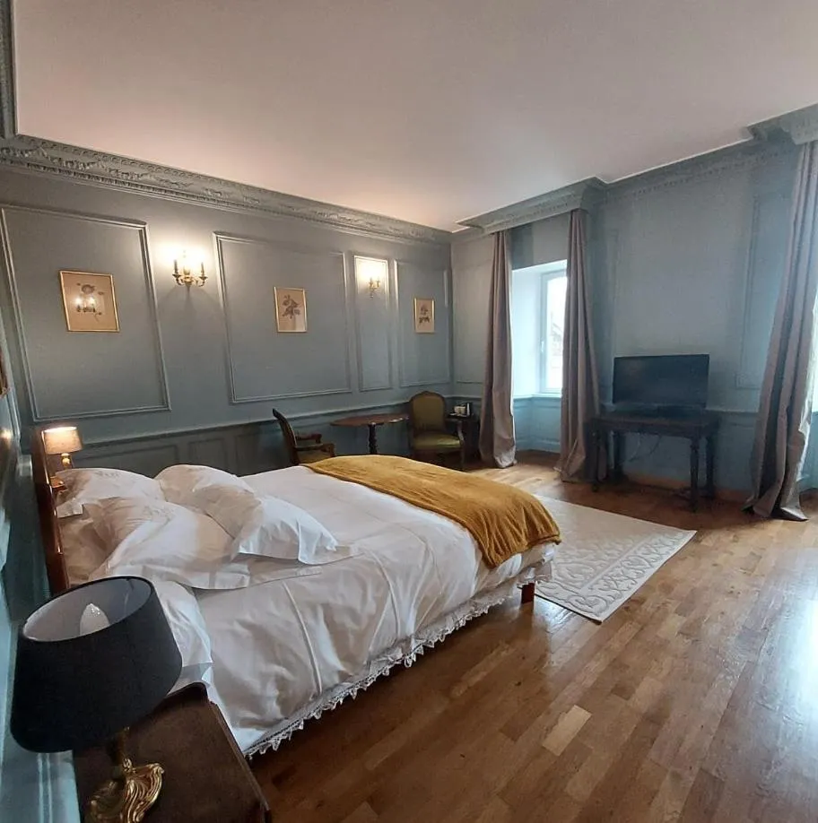 Bed in Les Chambres du Château du Rozel