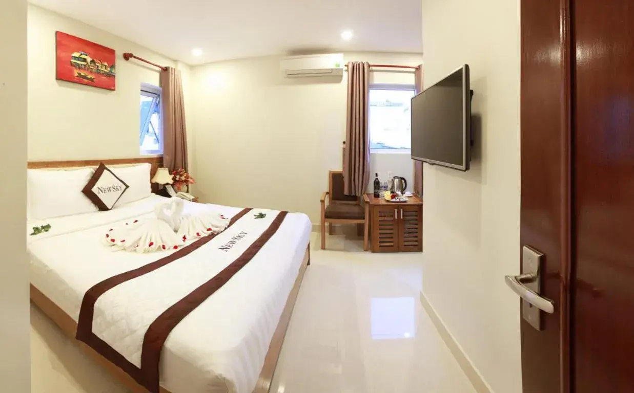 Photo of the whole room, Bed in New Sky Hotel Photo of the whole room, Bed in New Sky Hotel