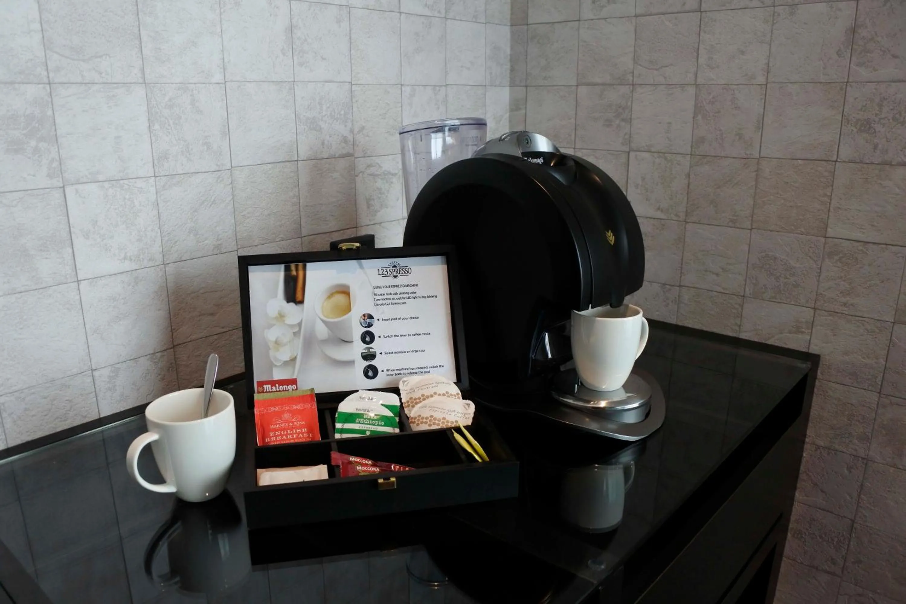 Coffee/tea facilities in Iconic Hotel