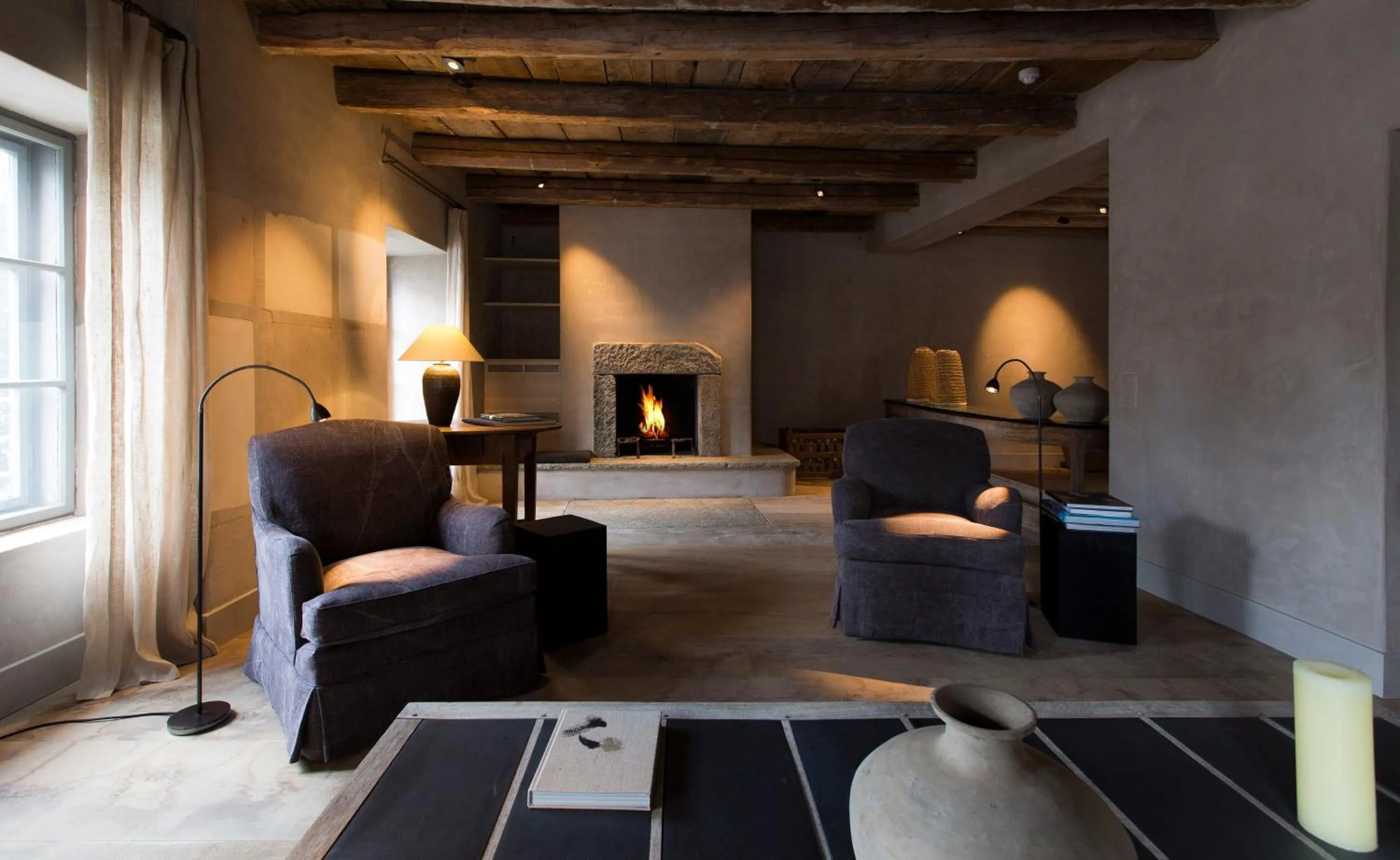 Communal lounge/ TV room in Townhouse Weisses Kreuz Boutiquehotel