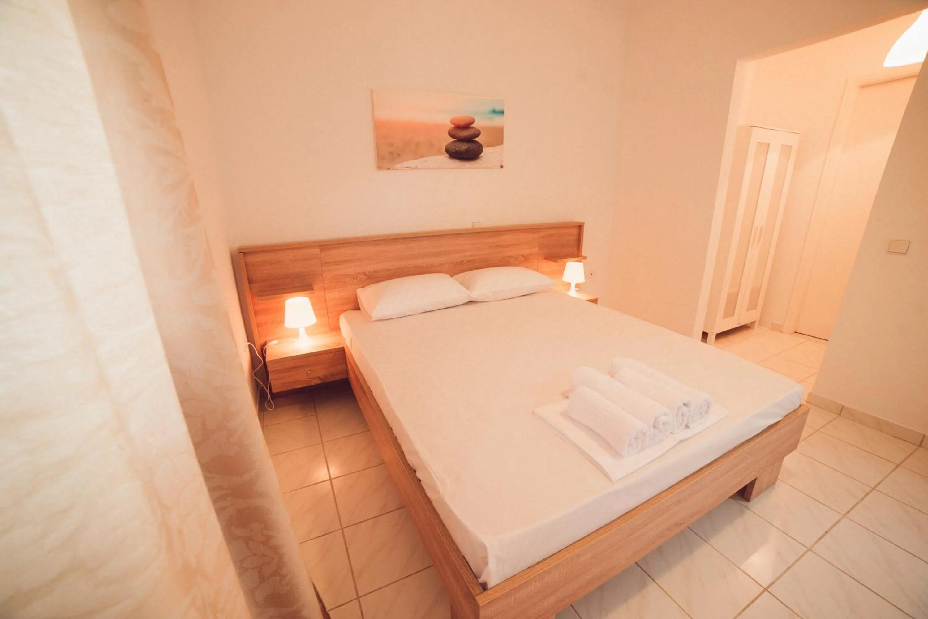 Bed in Nerina Studios Agios Nikitas