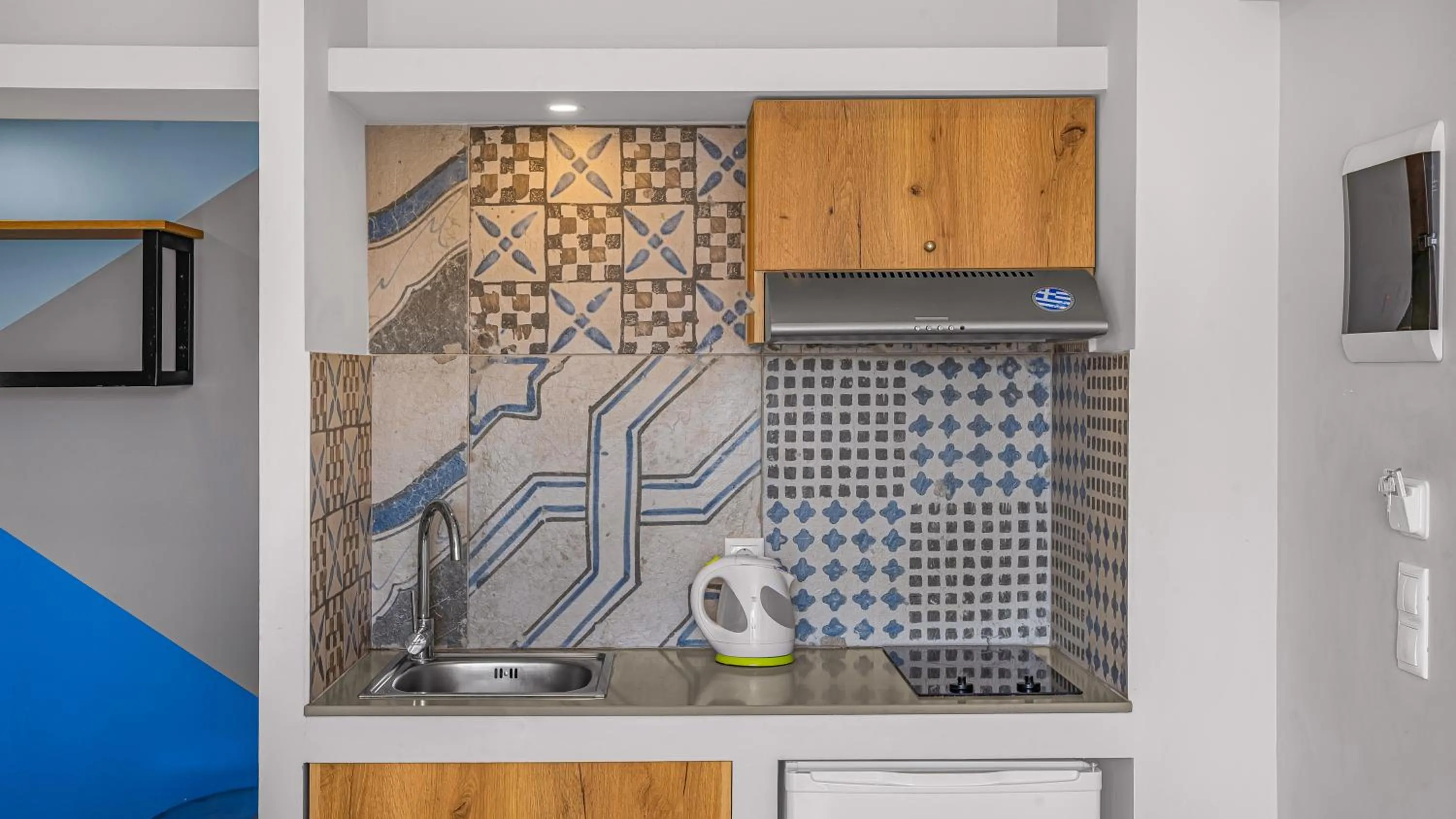 kitchen in Natali Apartments by Estia