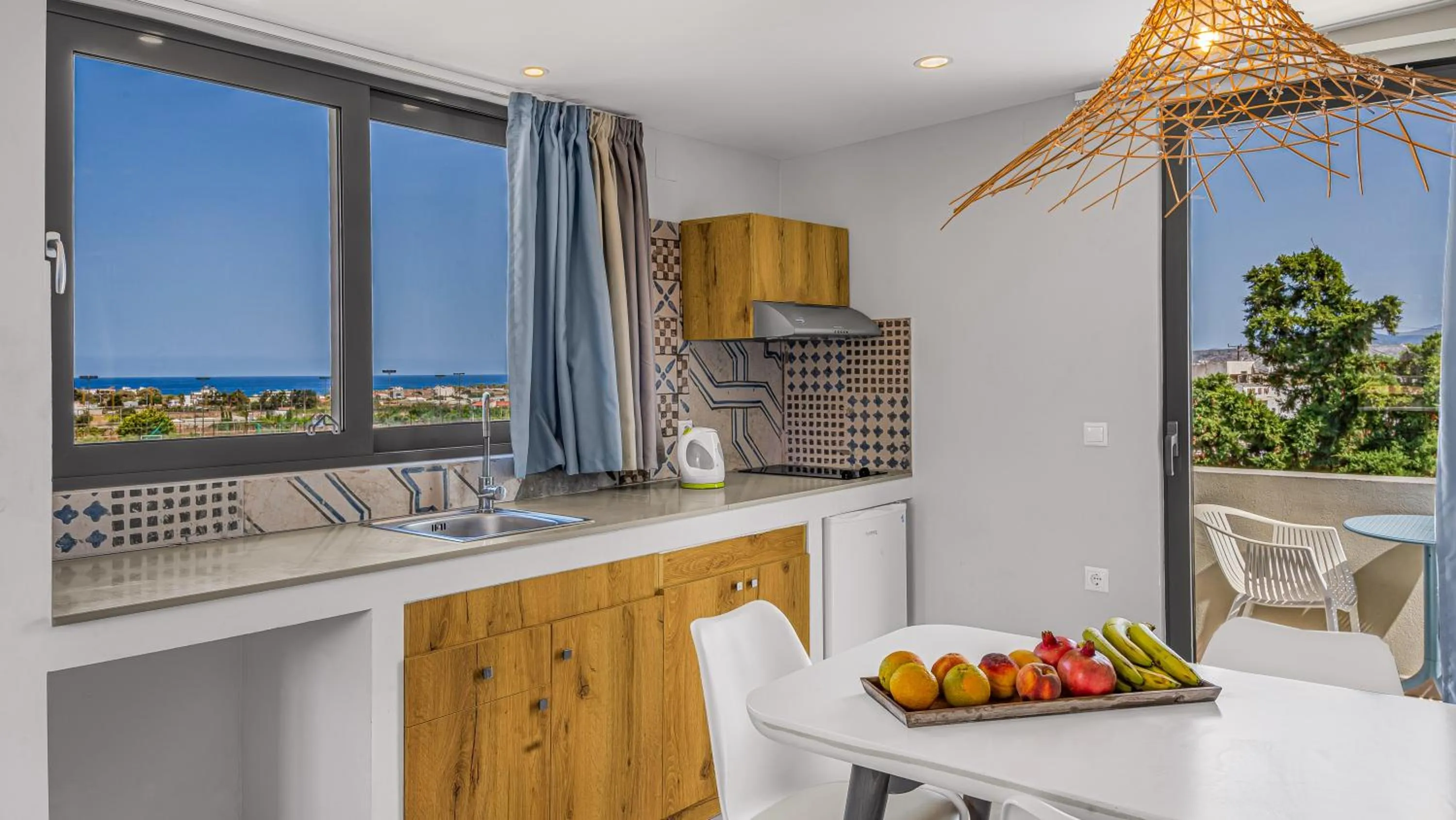 kitchen in Natali Apartments by Estia