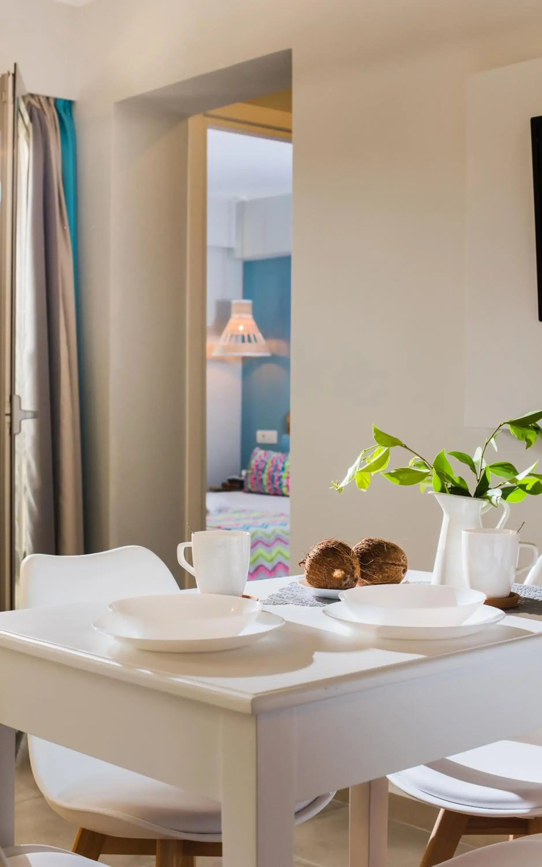 Dining area, Bed in Natali Apartments by Estia Dining area, Bed in Natali Apartments by Estia