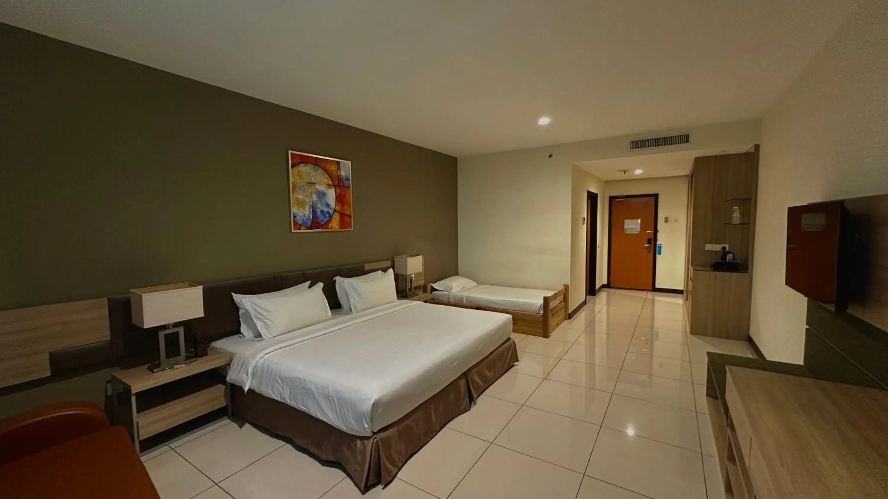 Photo of the whole room, Bed in One Pacific Hotel and Serviced Apartments