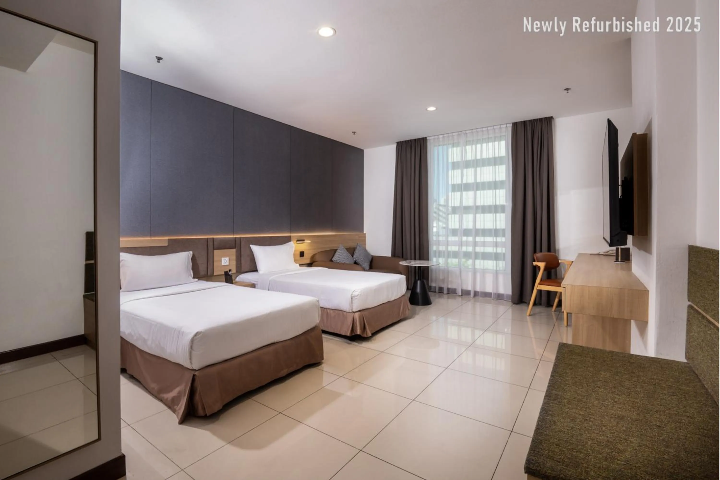 Bed in One Pacific Hotel and Serviced Apartments