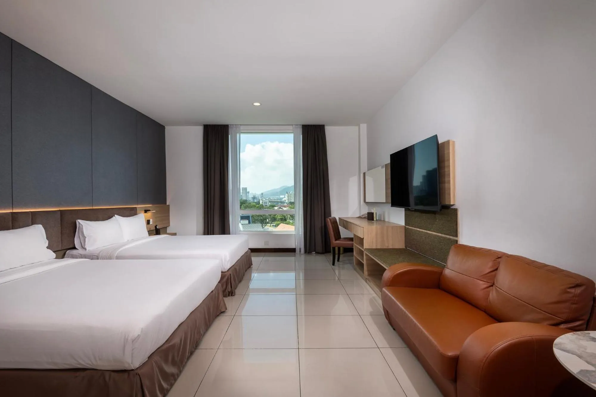 Bed in One Pacific Hotel and Serviced Apartments