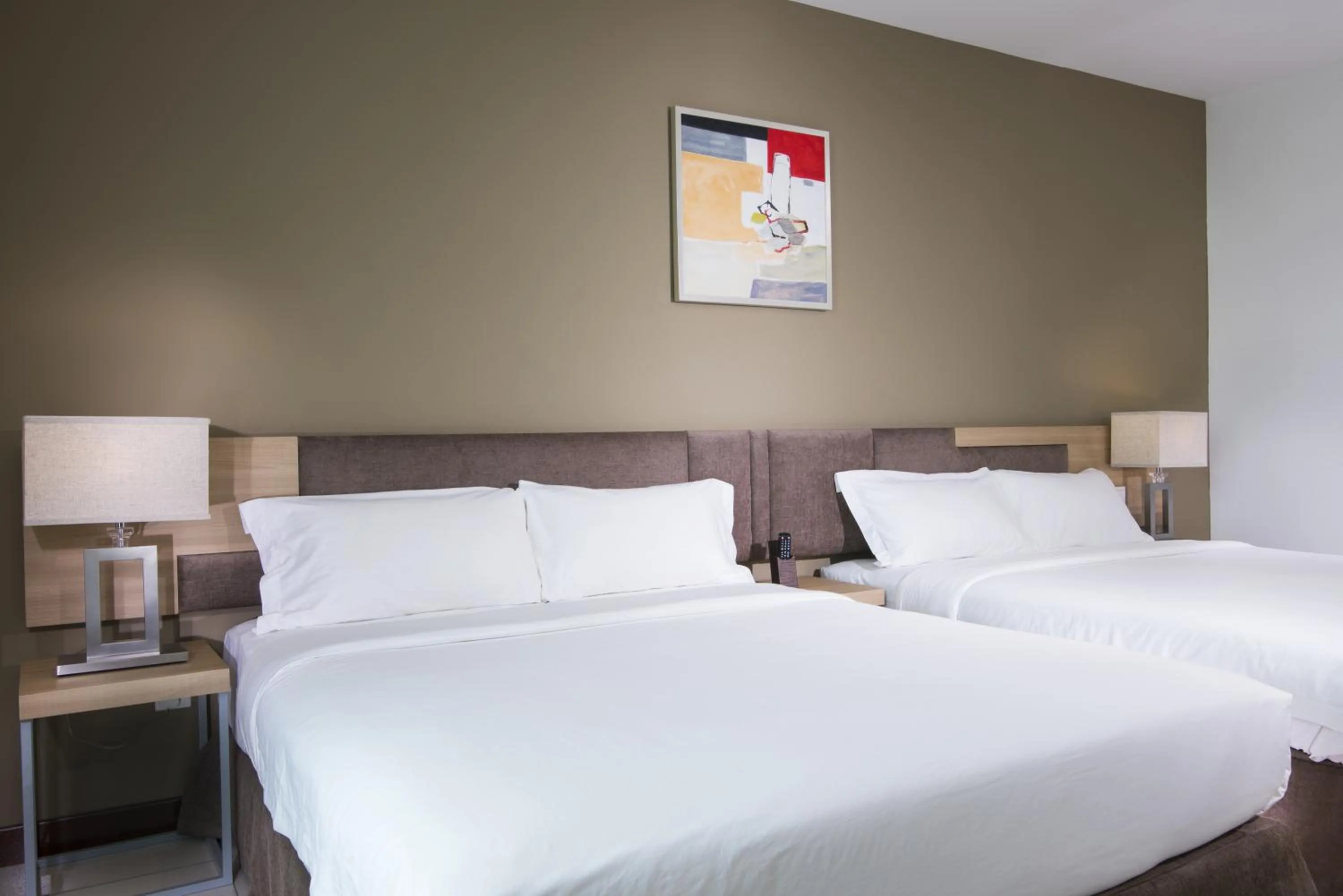 Bed in One Pacific Hotel and Serviced Apartments