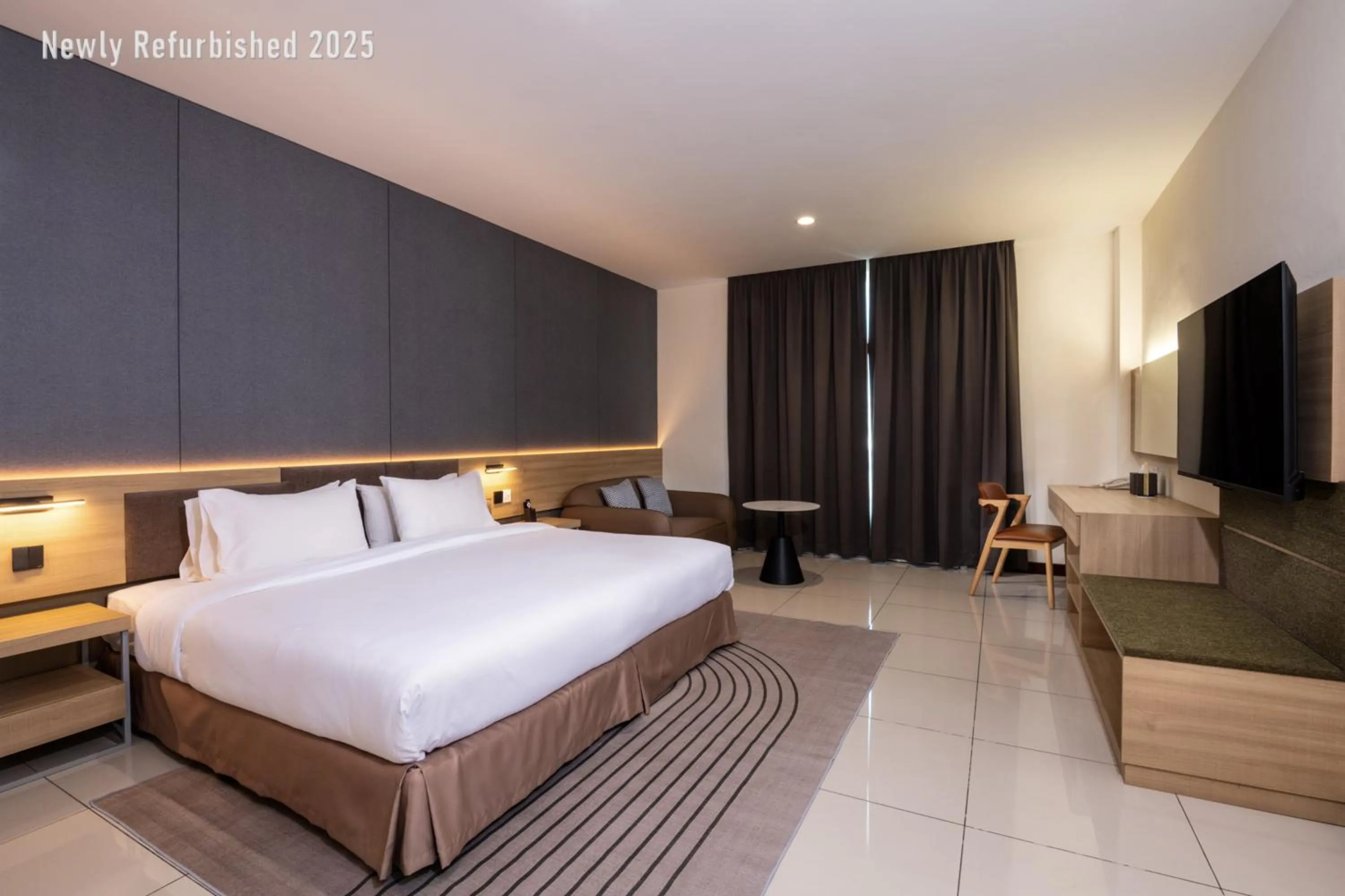 Bed in One Pacific Hotel and Serviced Apartments