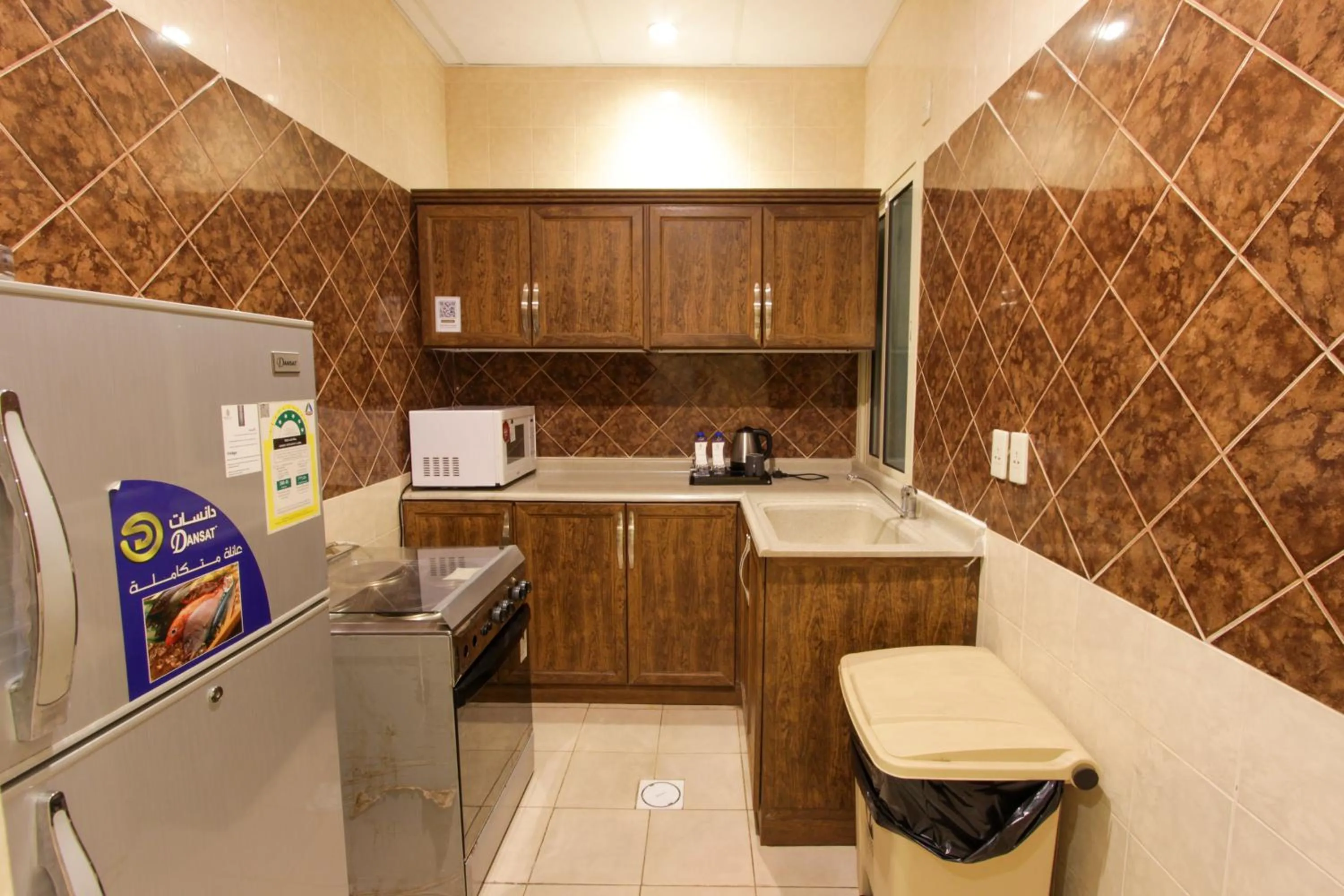 Kitchen or kitchenette in شقق مسكن الضيافة للشقق المخدومة 2