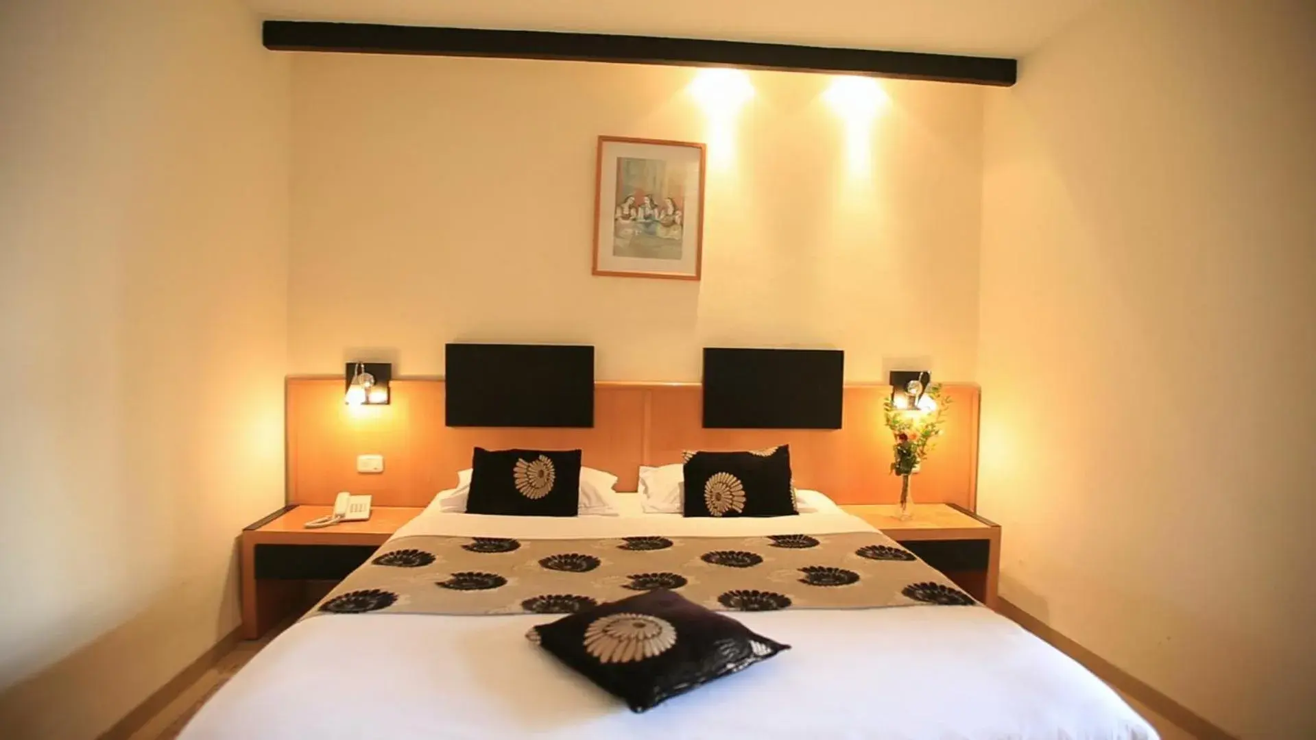 Bedroom in Hotel Les Palmiers Bedroom in Hotel Les Palmiers