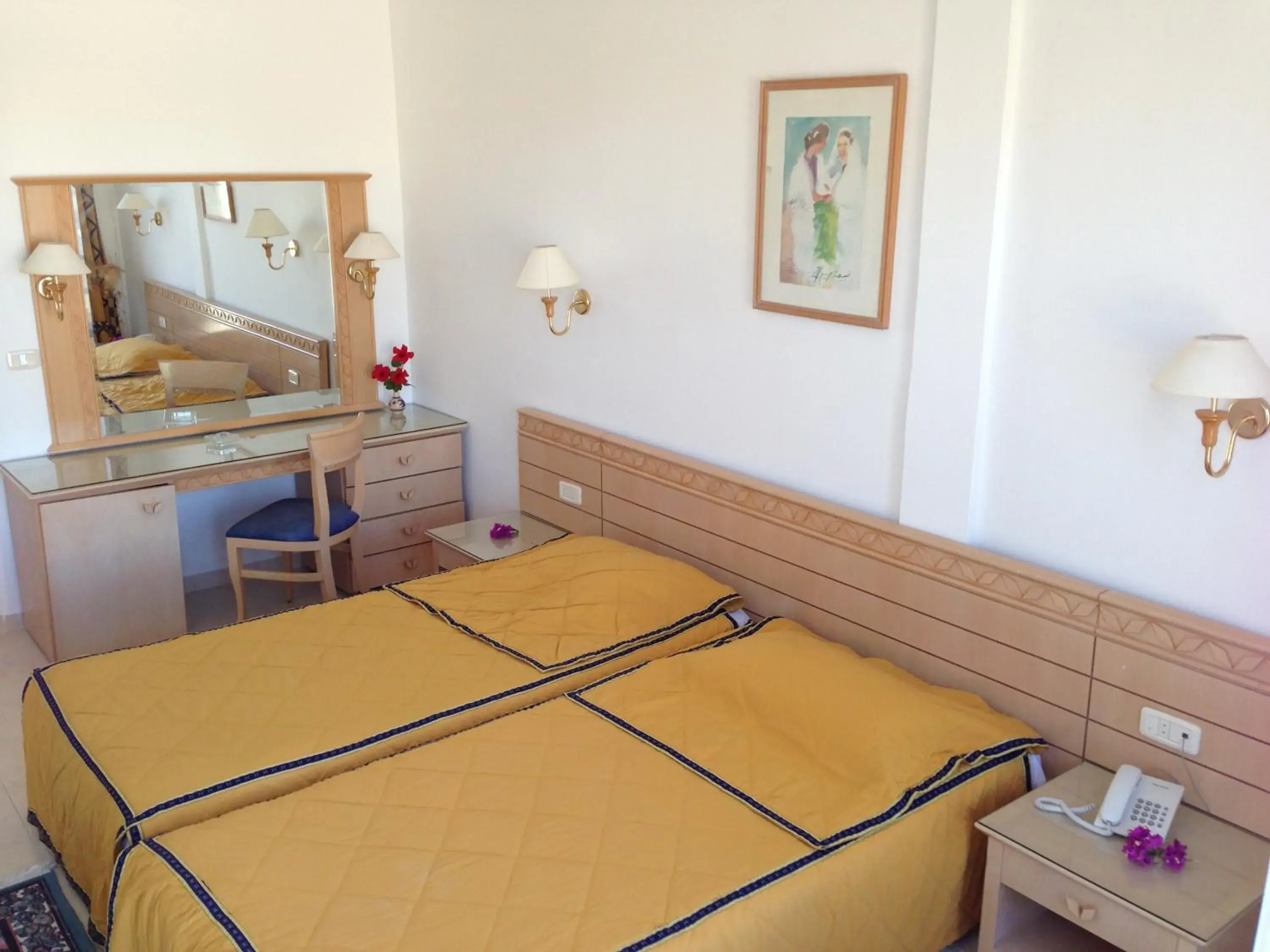 Bedroom in Hotel Les Palmiers Bedroom in Hotel Les Palmiers