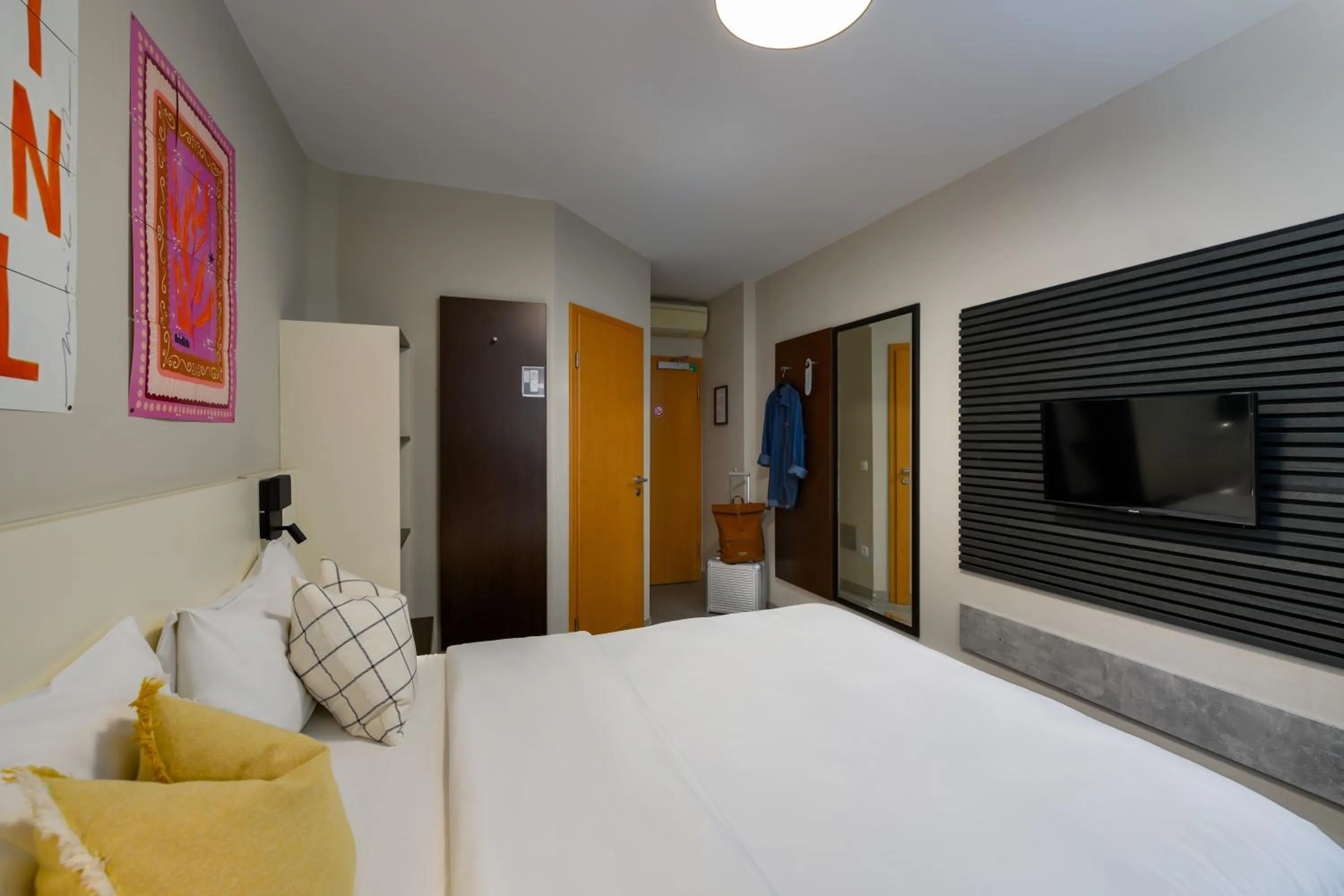 Bed in SleepinRoomz Boutique Hotel