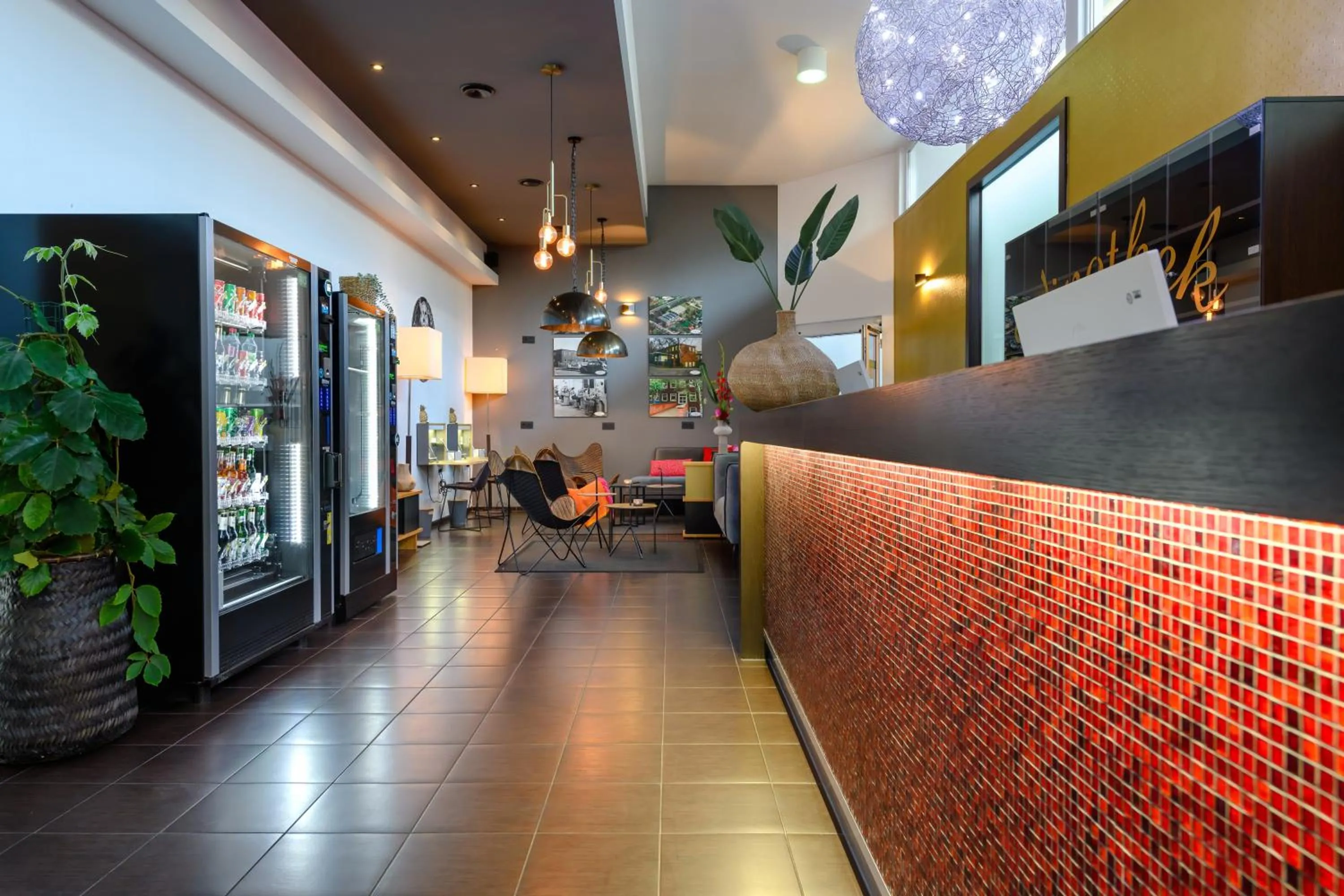 Lobby or reception in SleepinRoomz Boutique Hotel