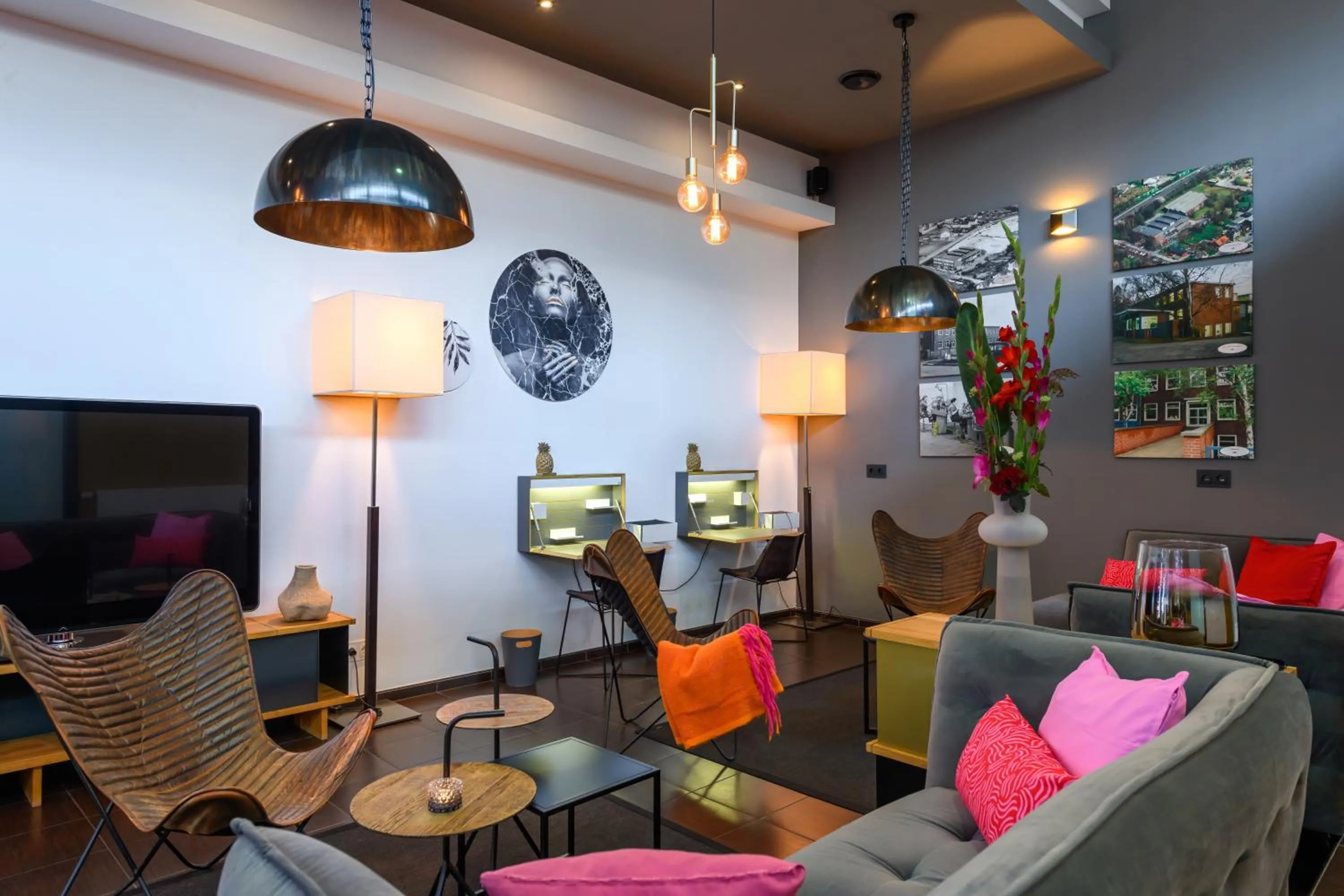 Communal lounge/ TV room in SleepinRoomz Boutique Hotel