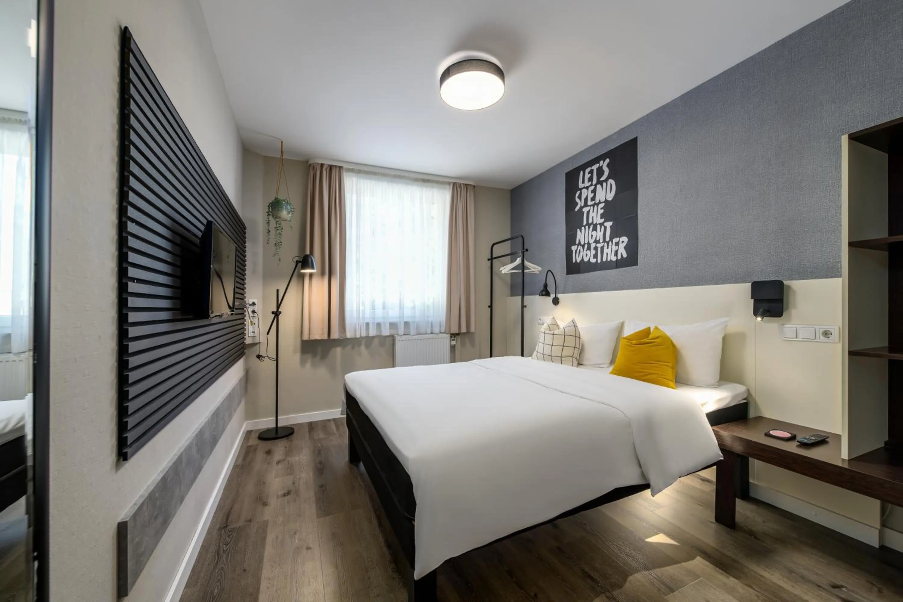 Bed in SleepinRoomz Boutique Hotel