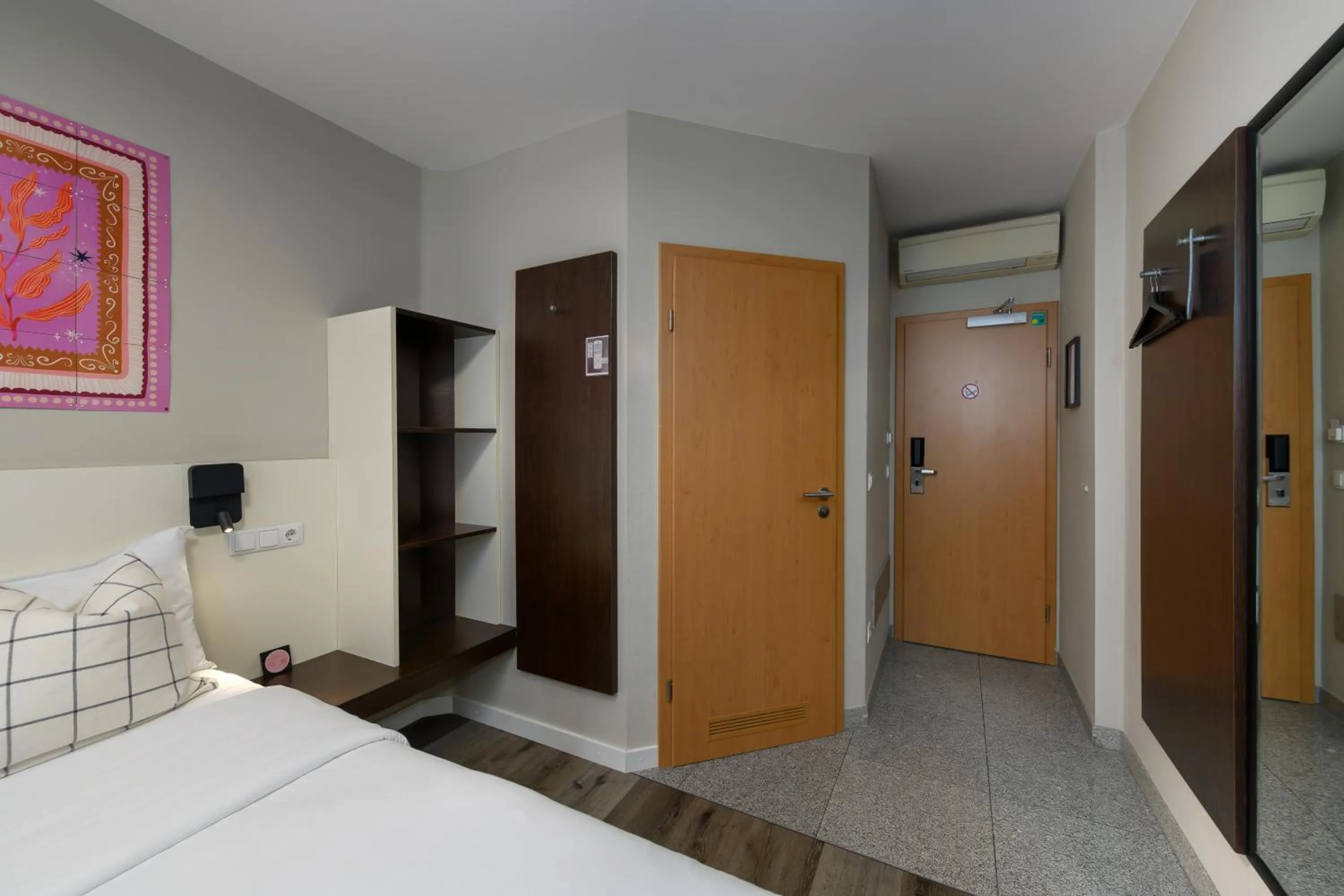 Bed in SleepinRoomz Boutique Hotel