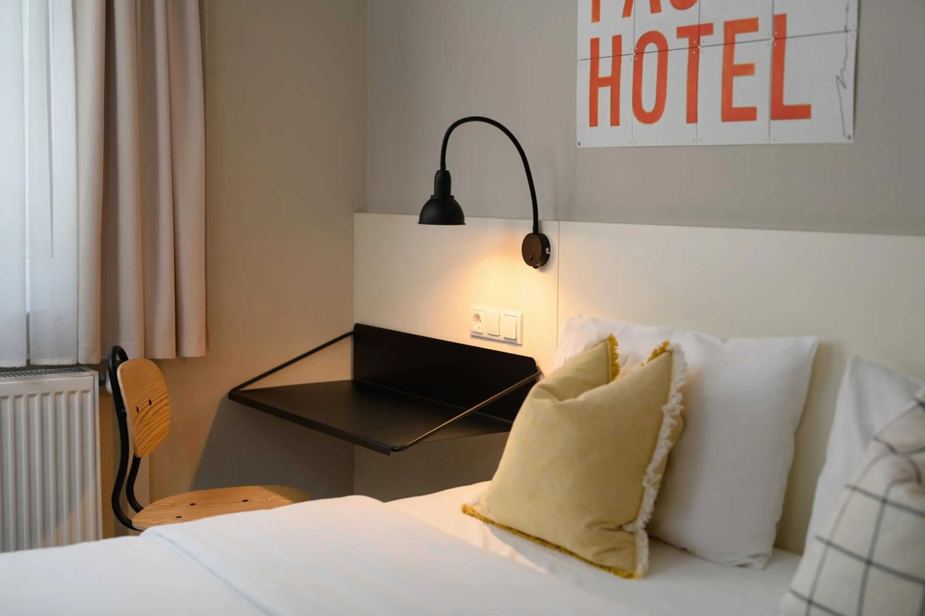 Bed in SleepinRoomz Boutique Hotel