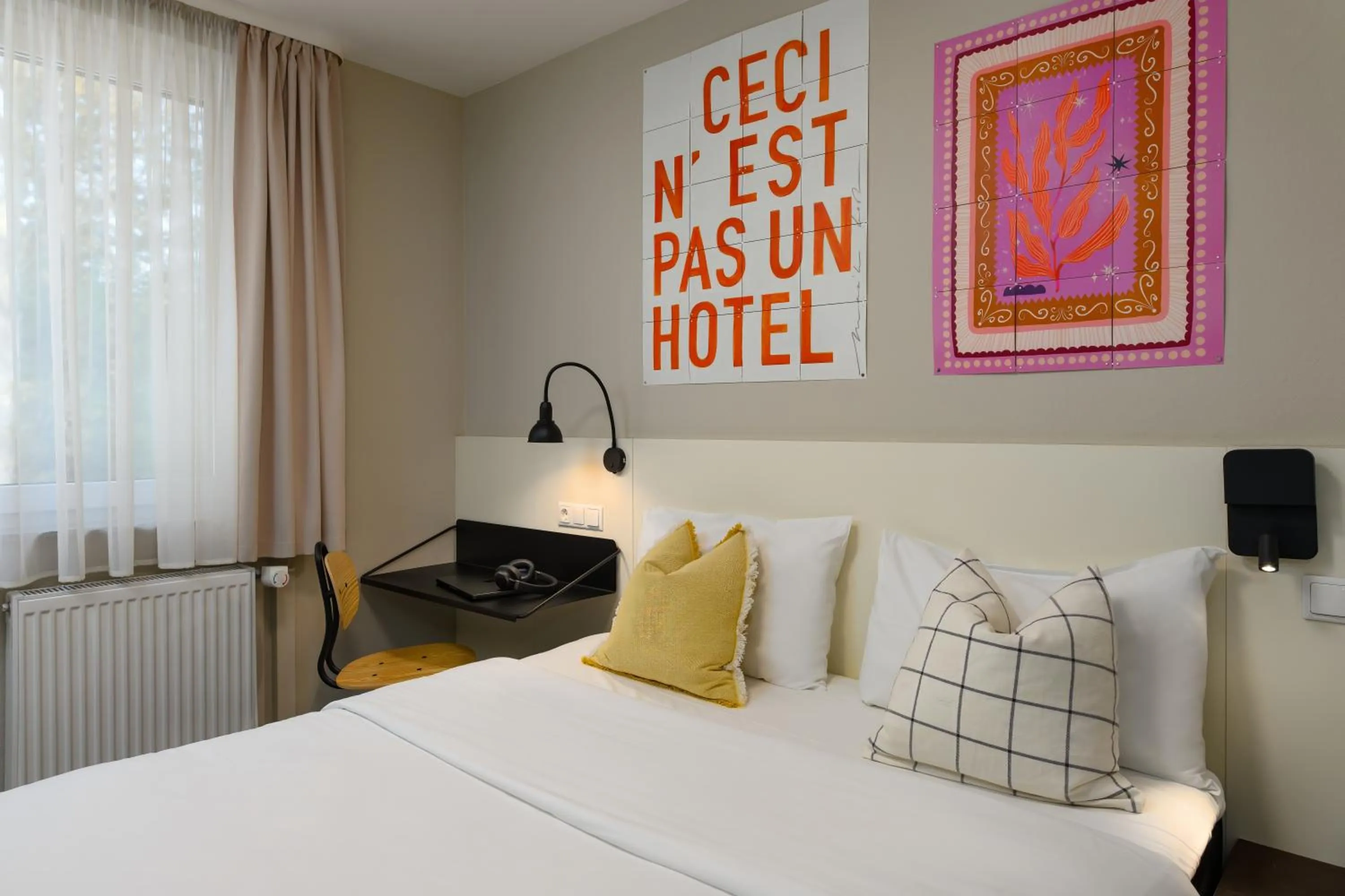 Bed in SleepinRoomz Boutique Hotel