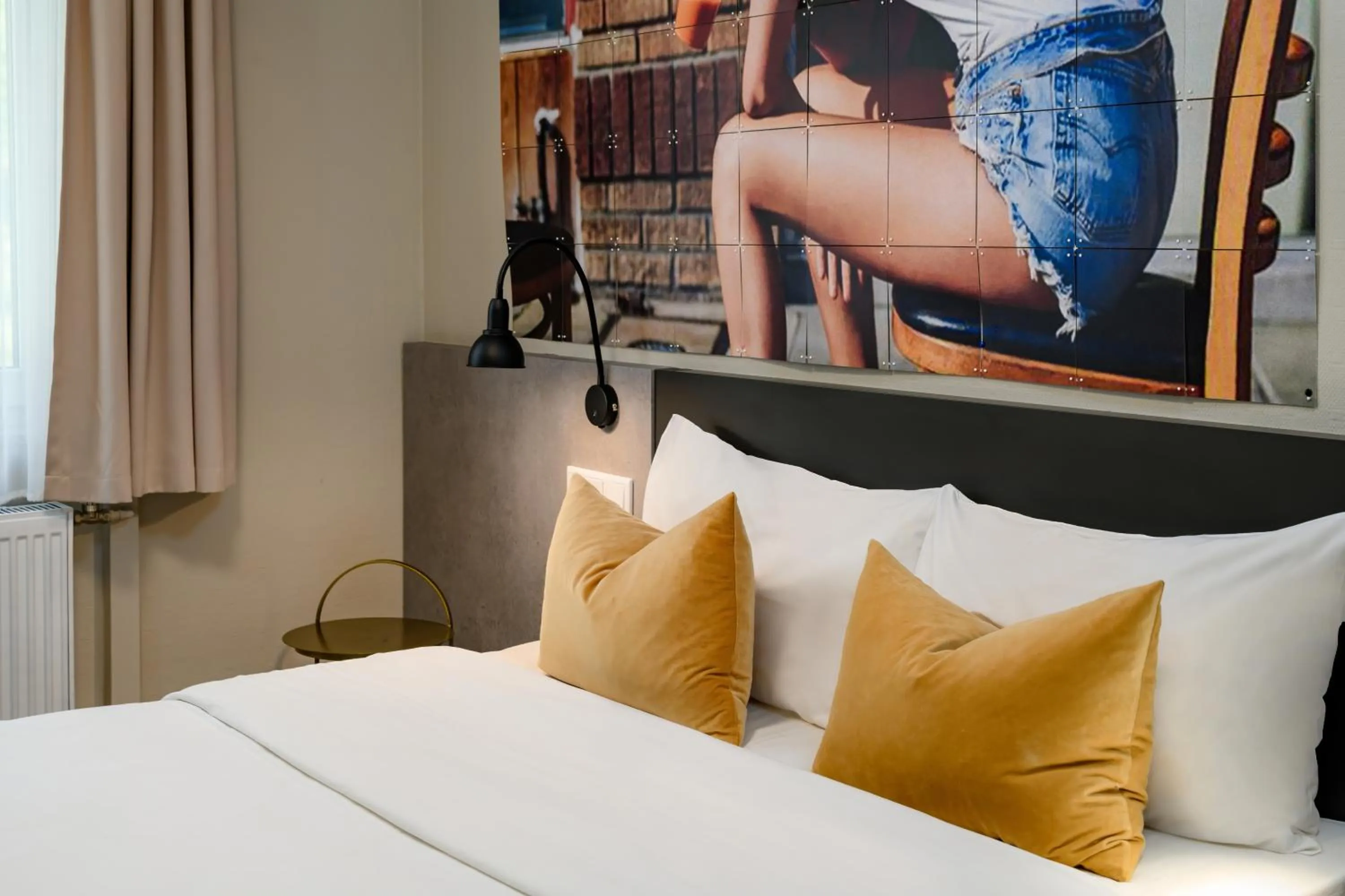 Bed in SleepinRoomz Boutique Hotel