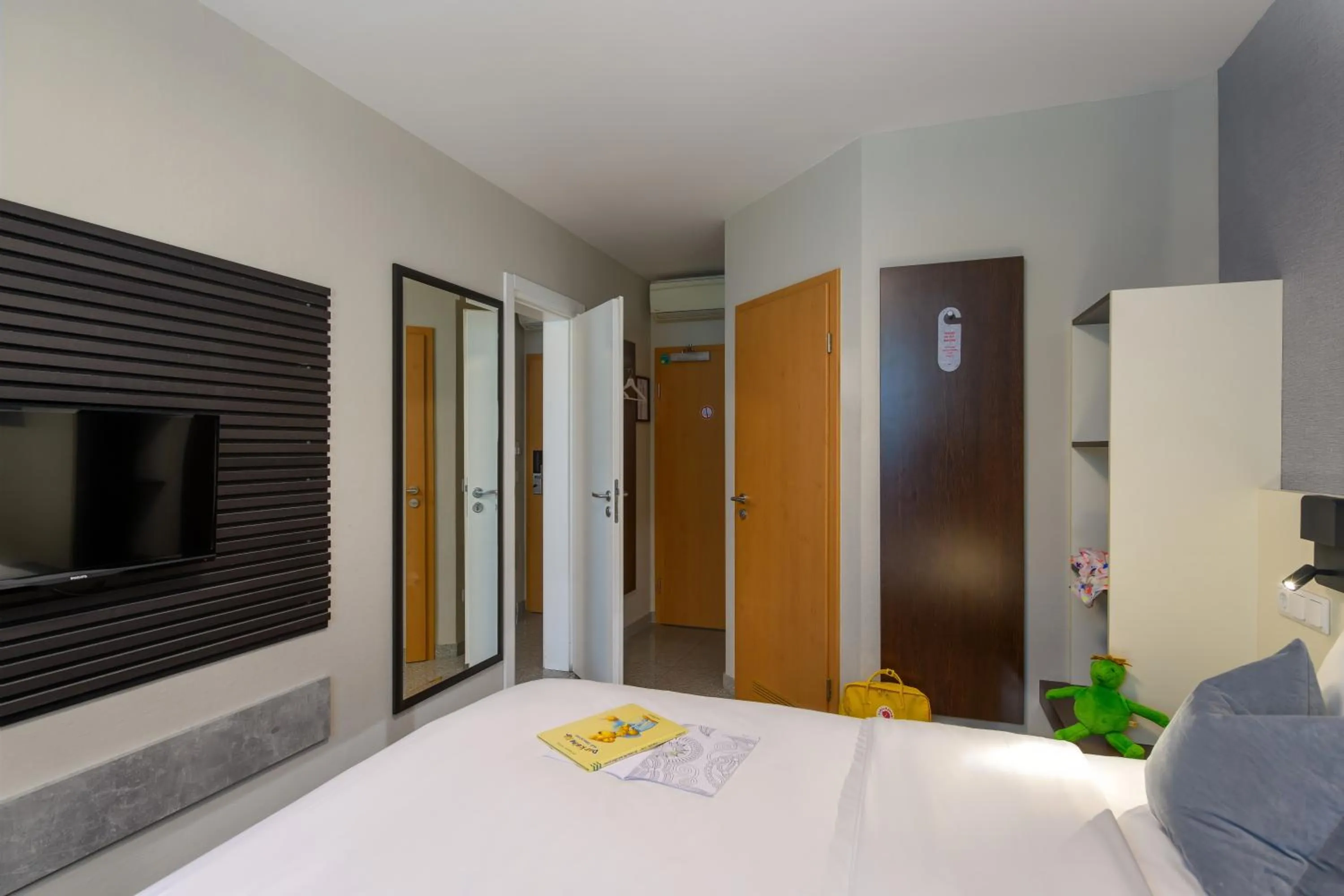 Bed in SleepinRoomz Boutique Hotel