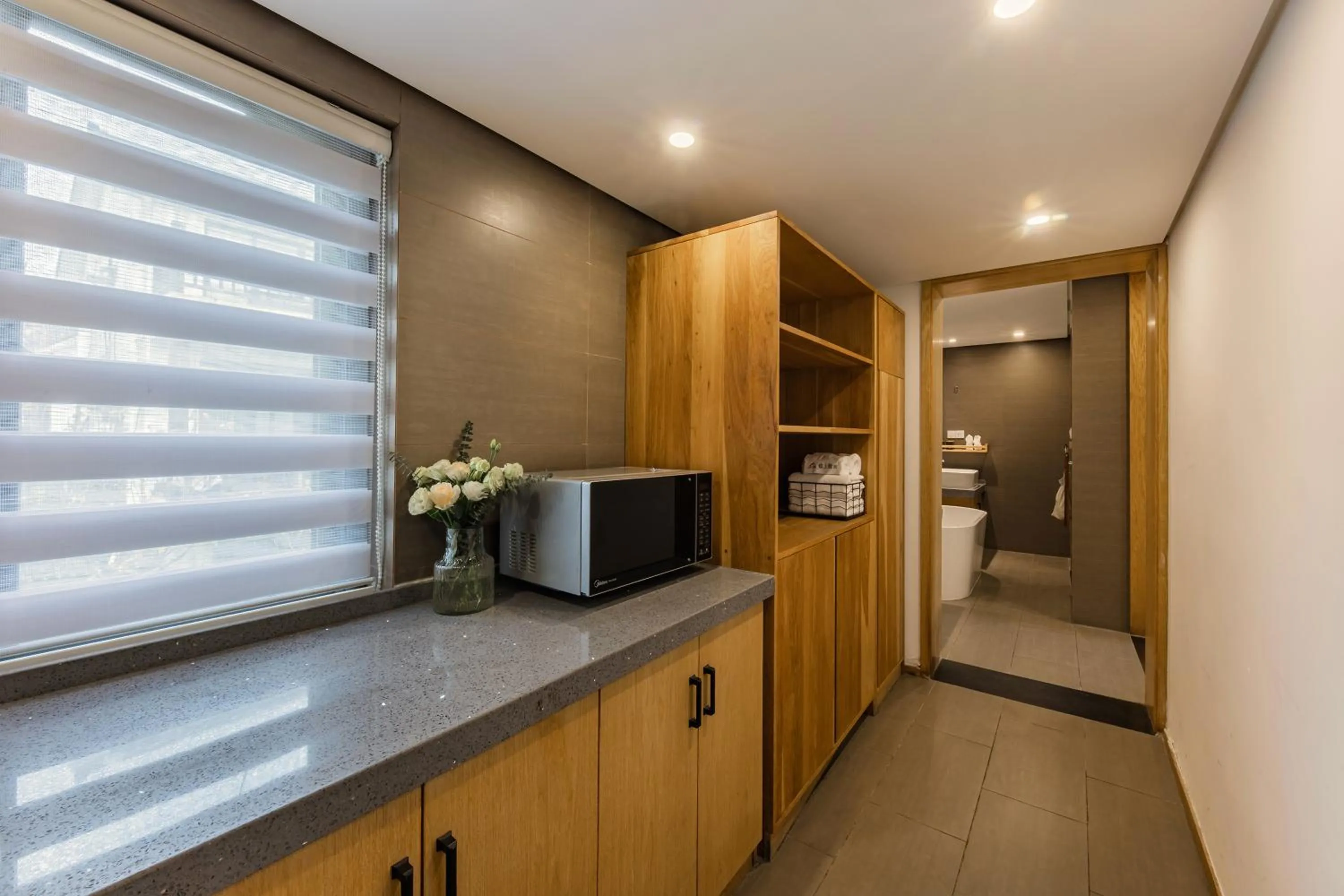 Kitchen or kitchenette in T innn - West Lake - Yueshang Yunshe Homestay - Hangzhou Taiziwan Park Branch