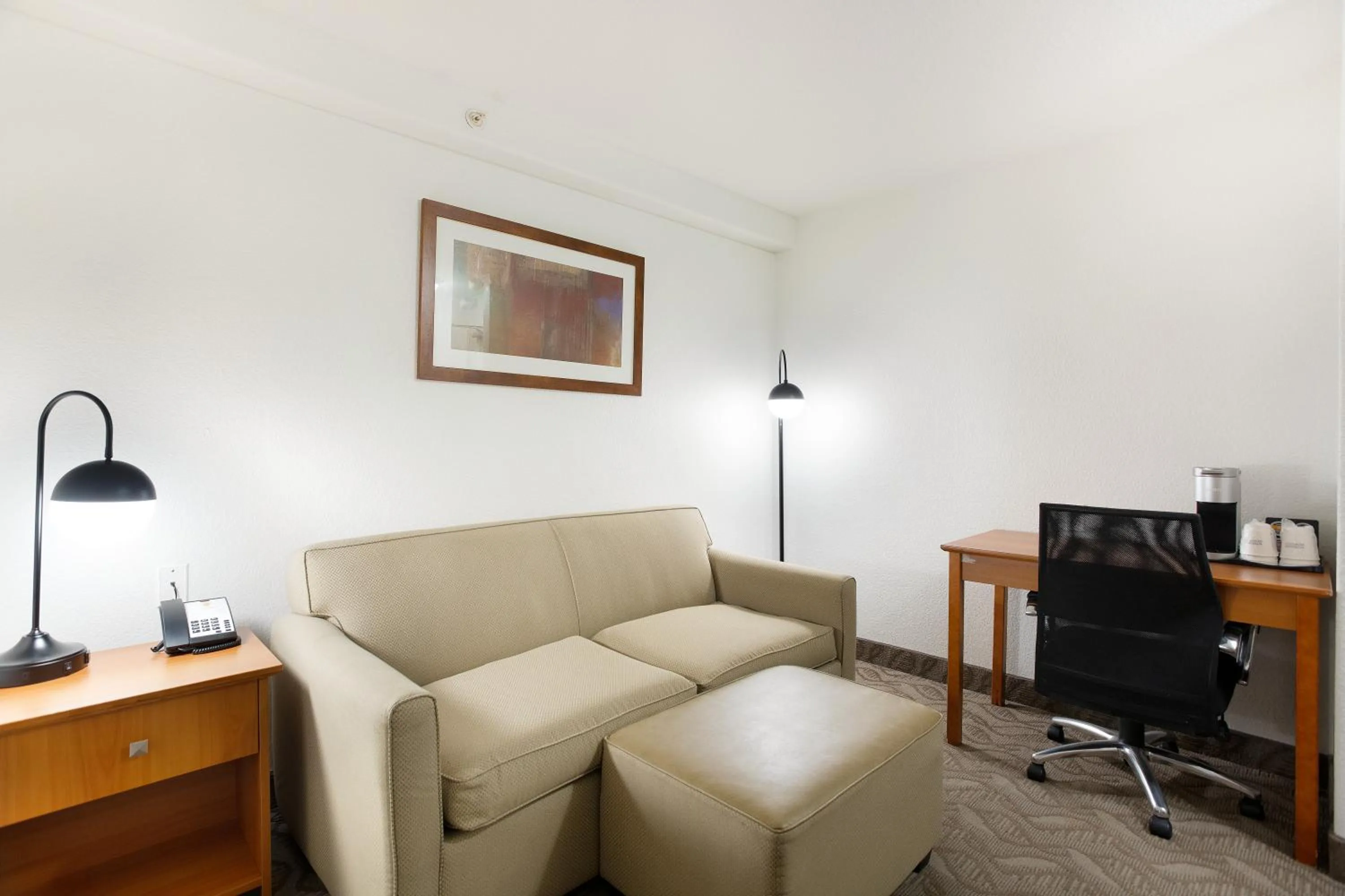 Living room in Super 8 by Wyndham Calgary Shawnessy Area