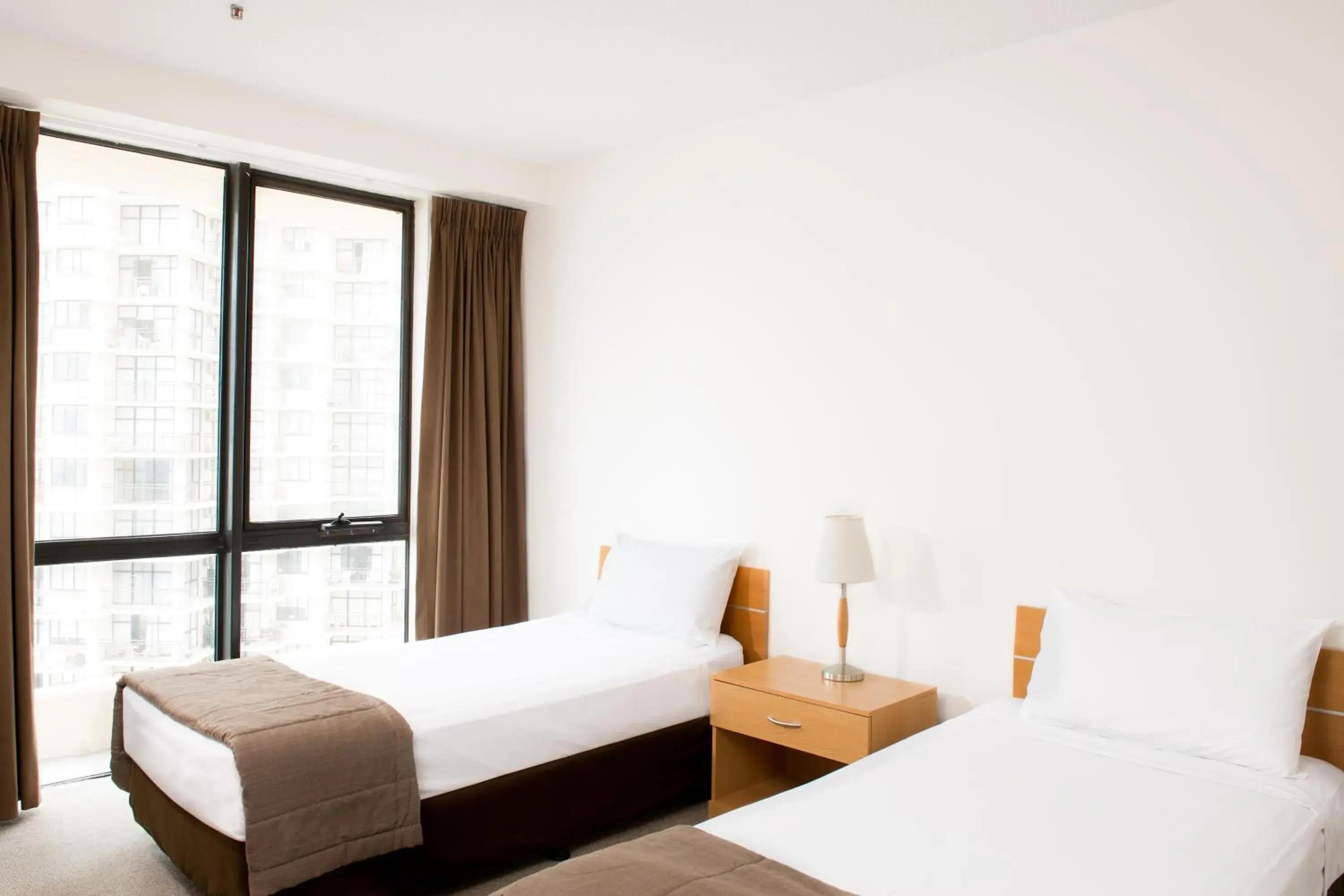 Bed in Paradise Centre Apartments Bed in Paradise Centre Apartments