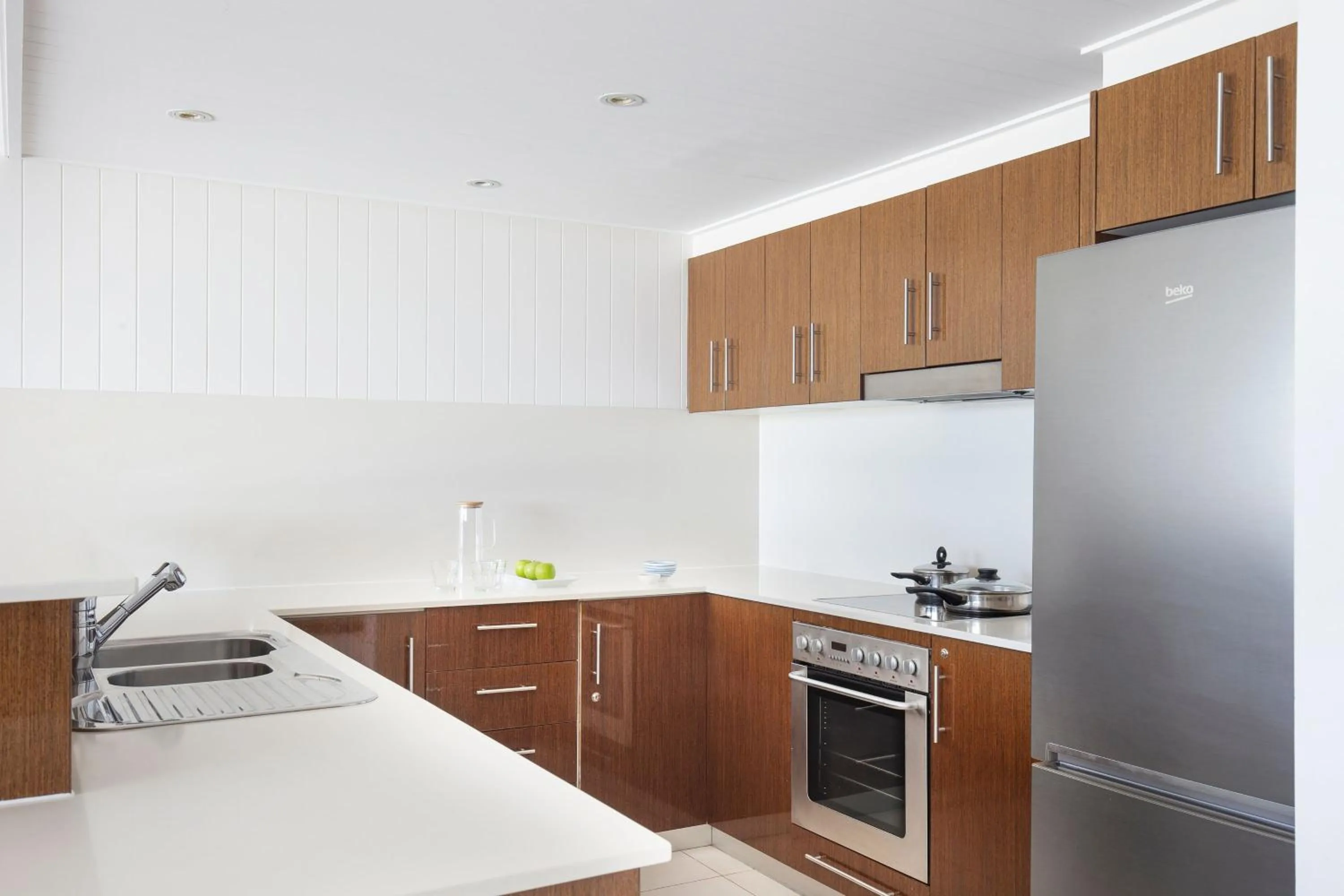 Kitchen or kitchenette in Mantra on Salt Beach