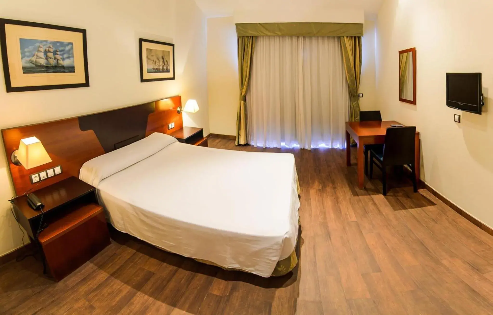 Bed in Hotel Apartamento Martín Alonso Pinzón Bed in Hotel Apartamento Martín Alonso Pinzón