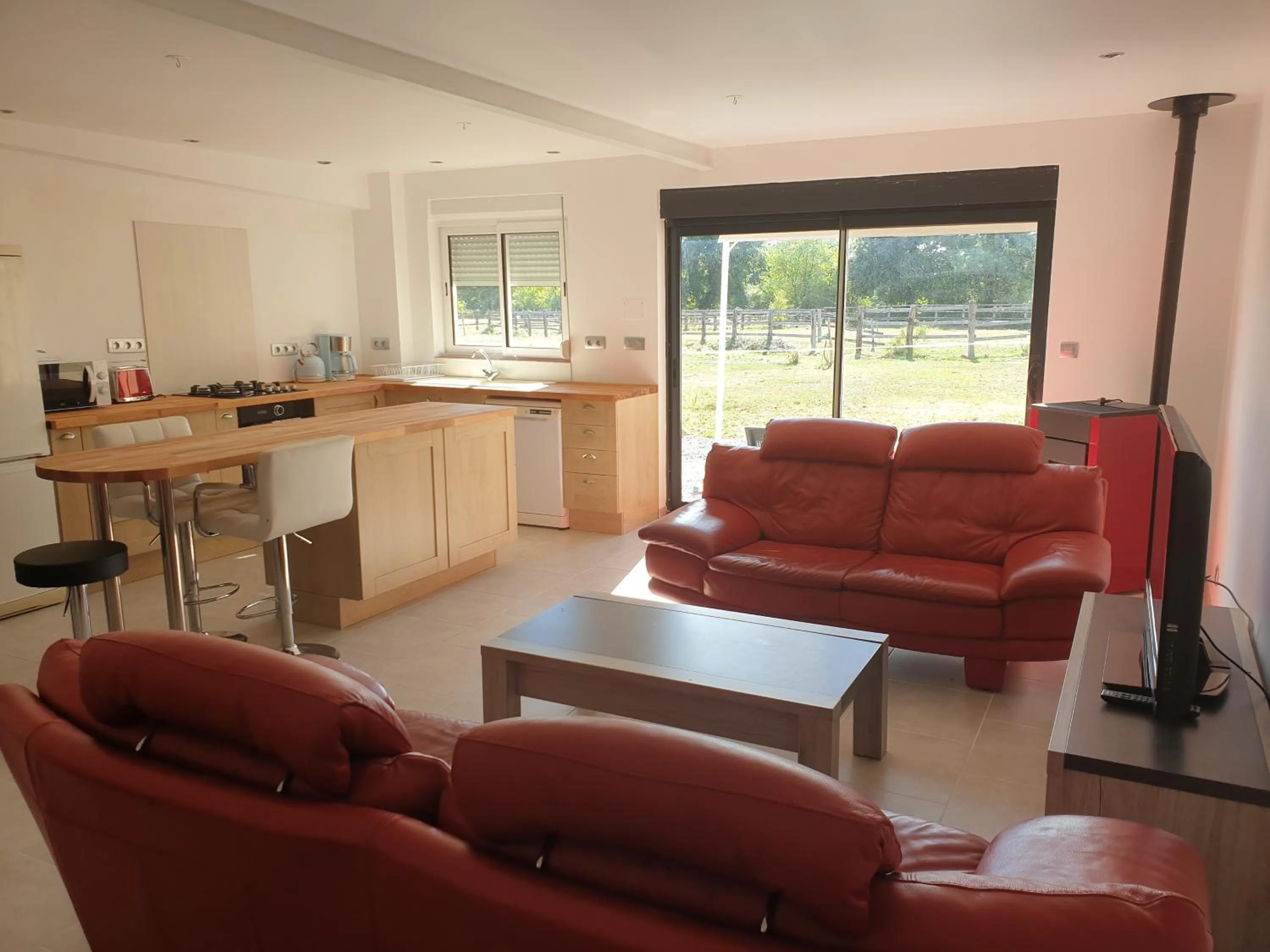 Living room in Gîte et Chambre d'hôte de l'élevage du Lattay