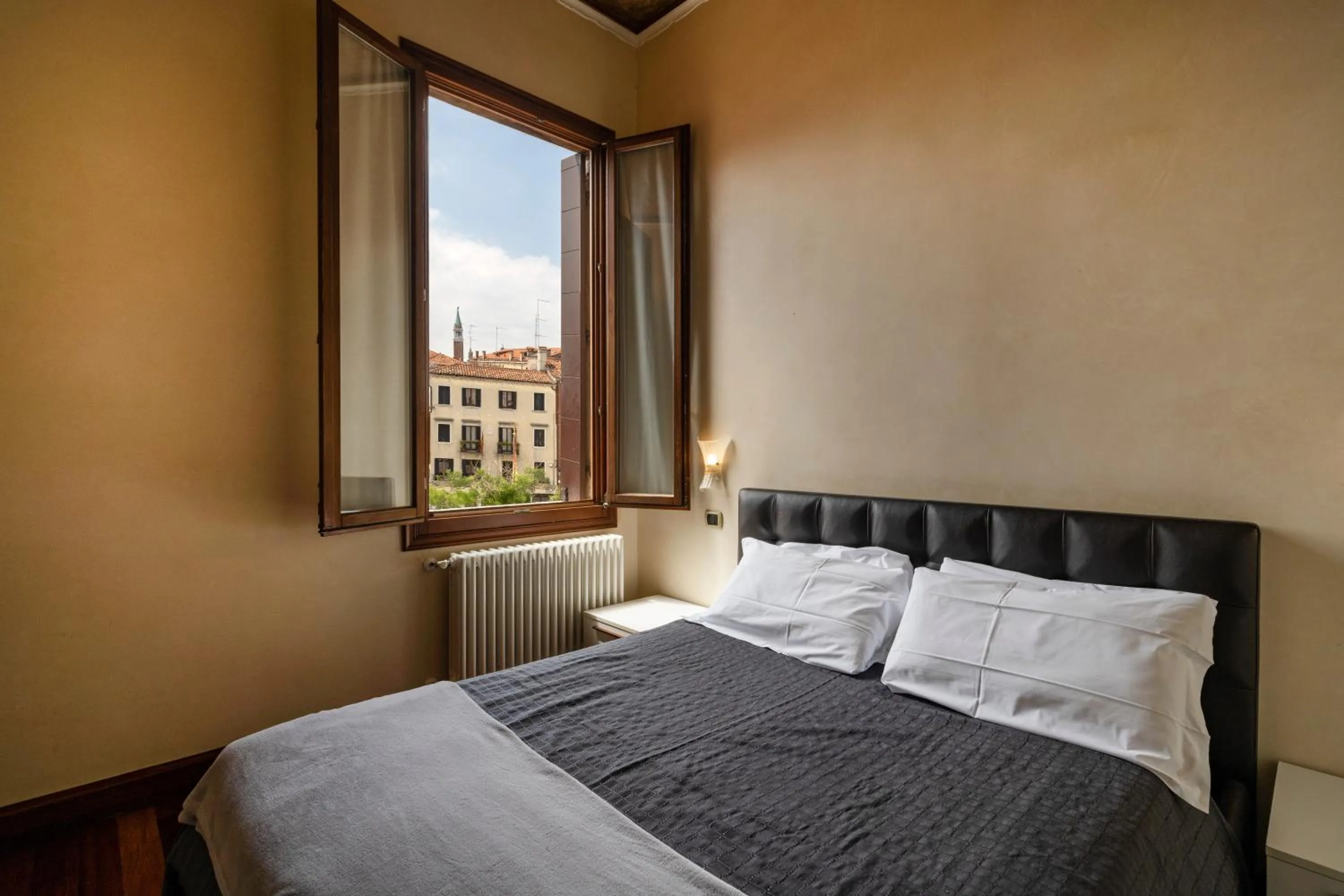 Bed in Doge Morosini Palace by Wonderful Italy