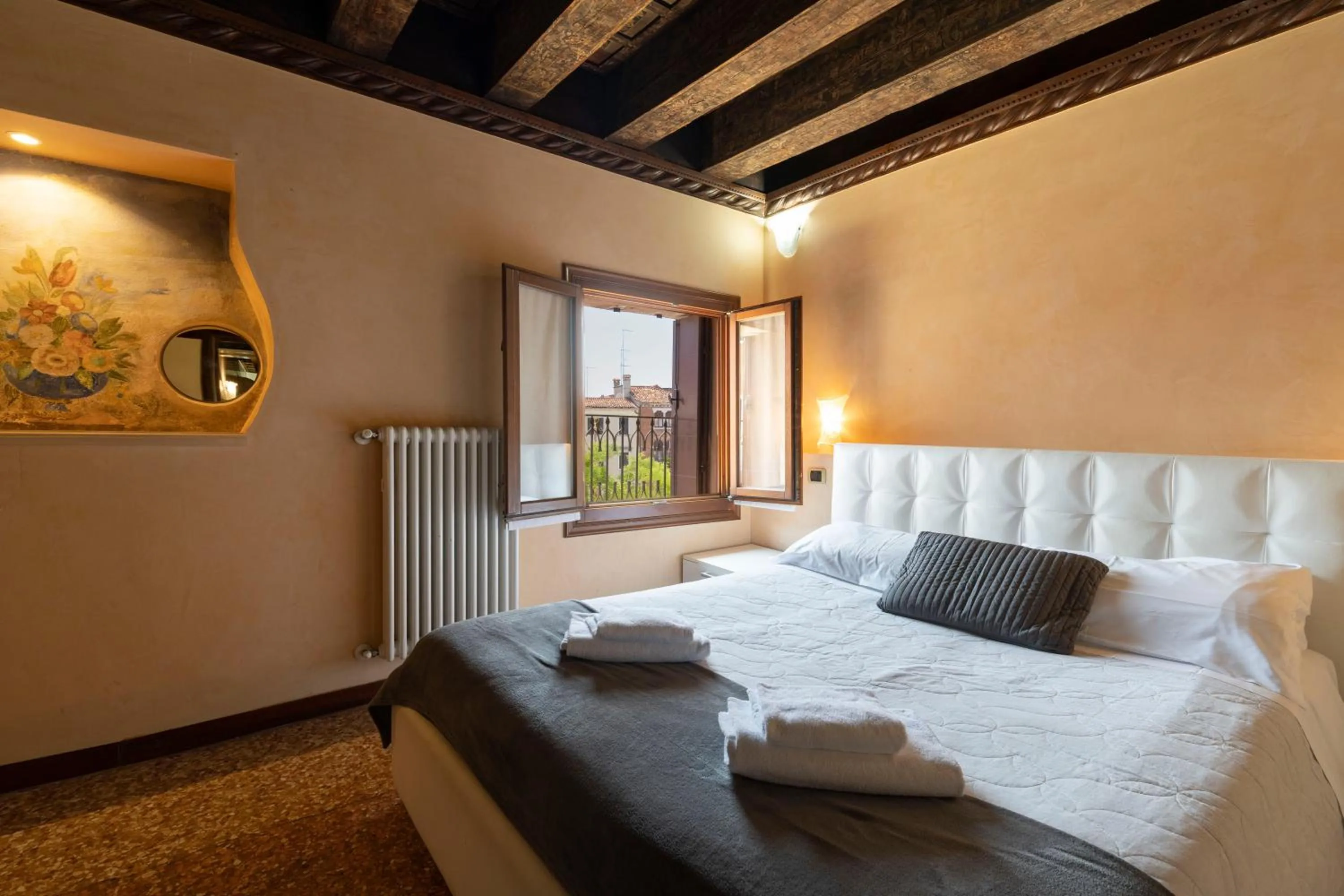 Bed in Doge Morosini Palace by Wonderful Italy